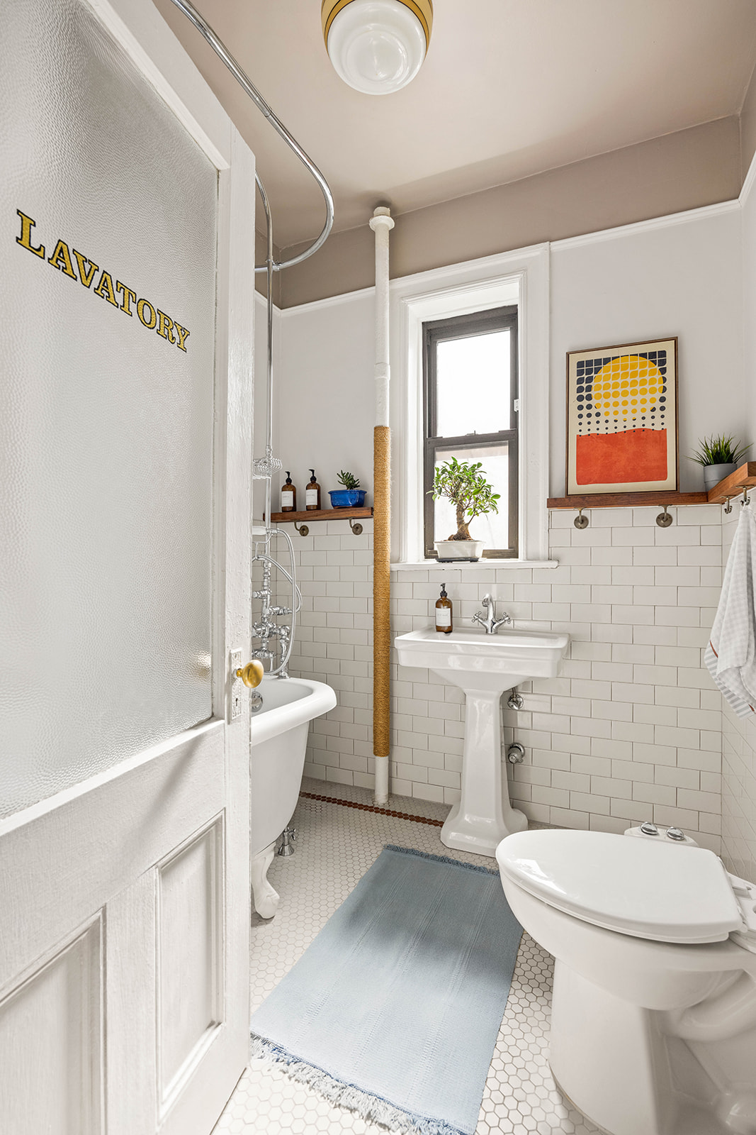457 State Street, Unit 4BC Brooklyn, NY 11217 - Photo 9 of 13 a bathroom with a toilet sink and mirror