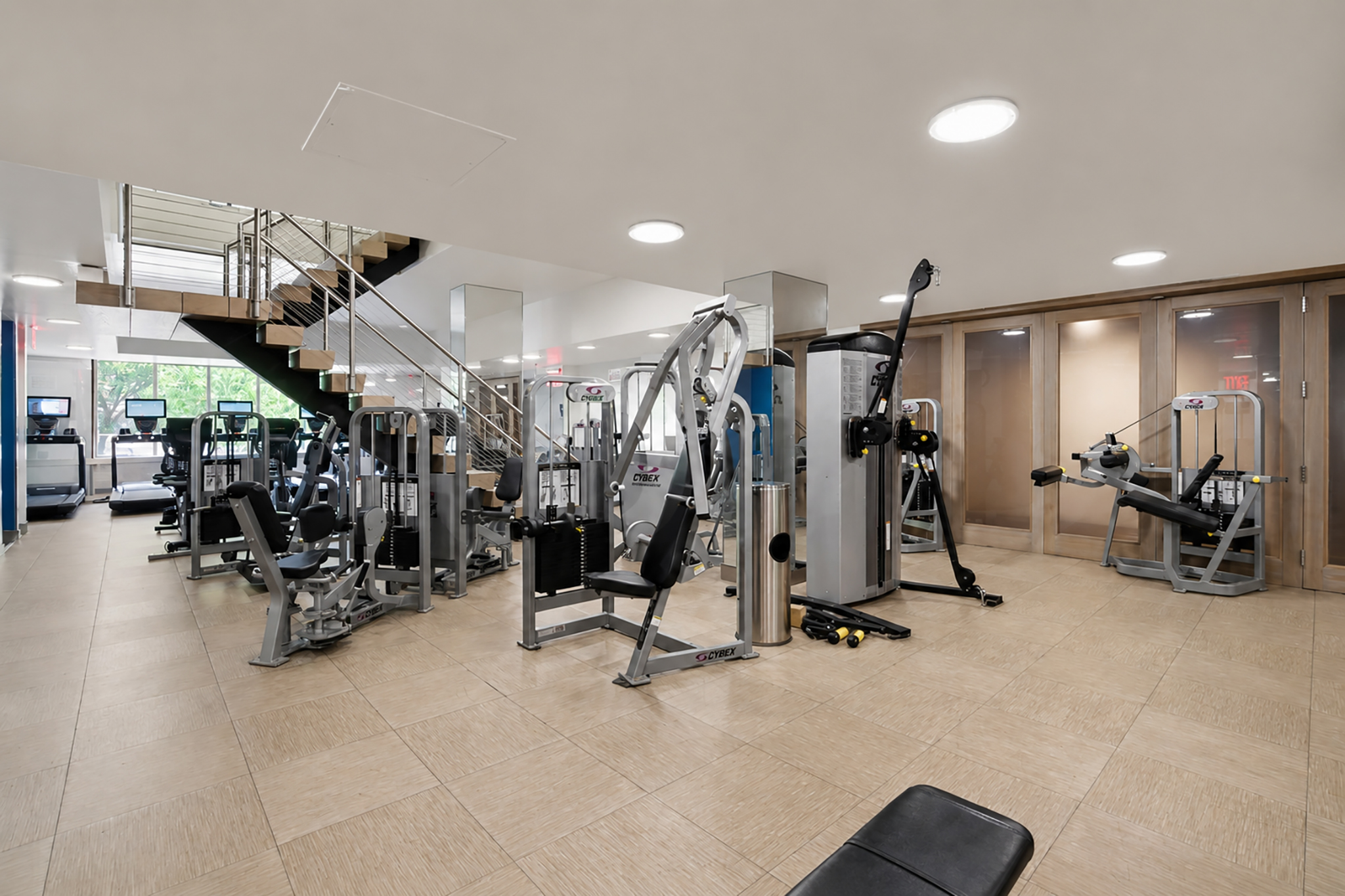 225 Rector Place, Unit 9T Manhattan, NY 10280 - Photo 6 of 15 a view of a room with gym equipment