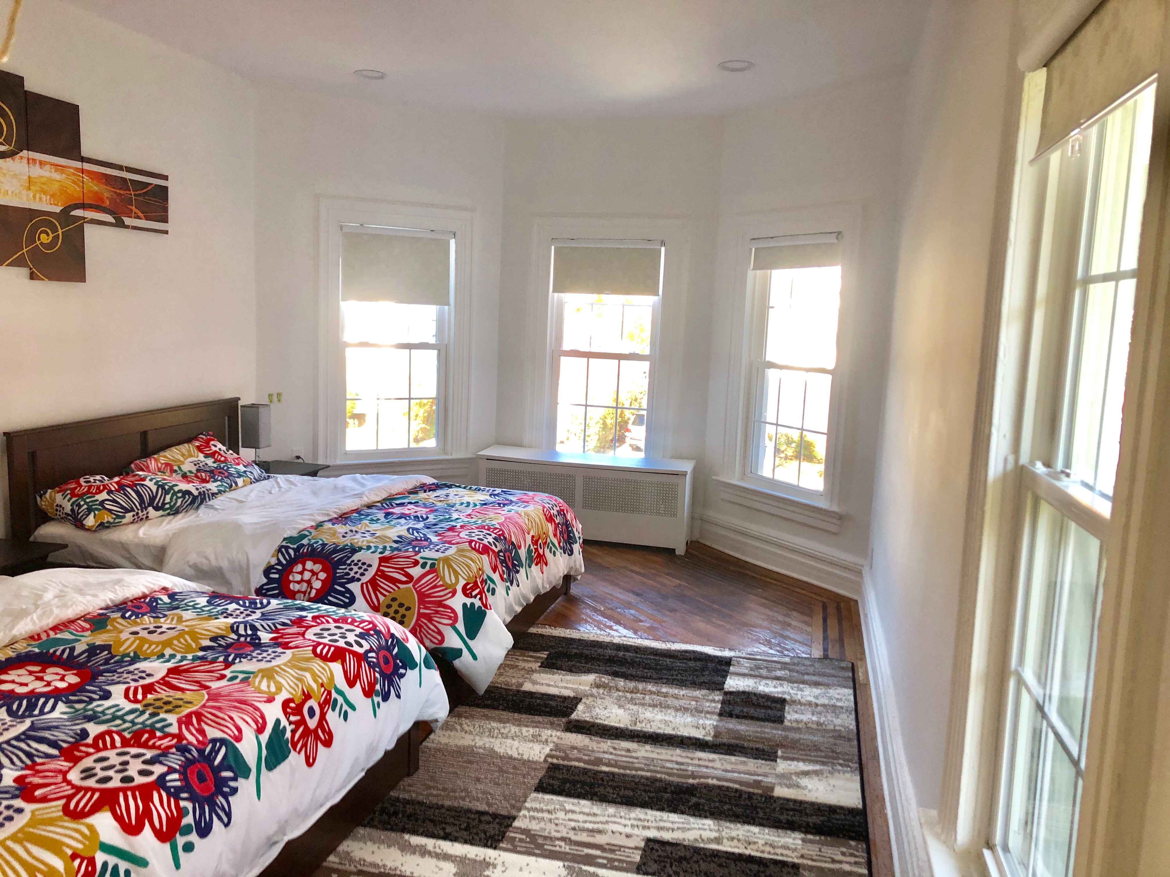 1112 Beverley Road Brooklyn, NY 11218 - Photo 45 of 53 a bedroom with two beds and a window