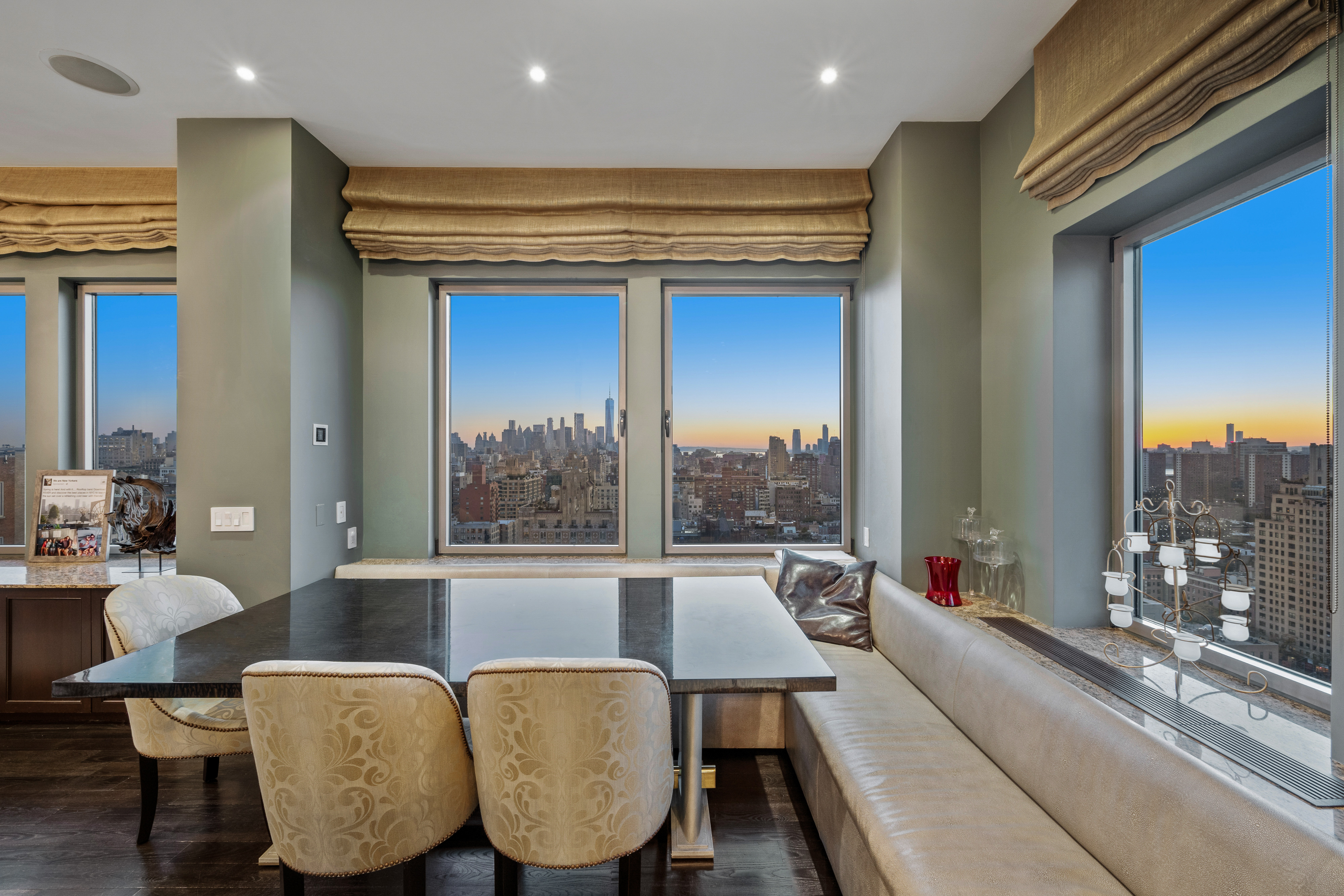 252 7th Avenue, Unit PHD Manhattan, NY 10001 - Photo 18 of 26 a living room with furniture and a large window