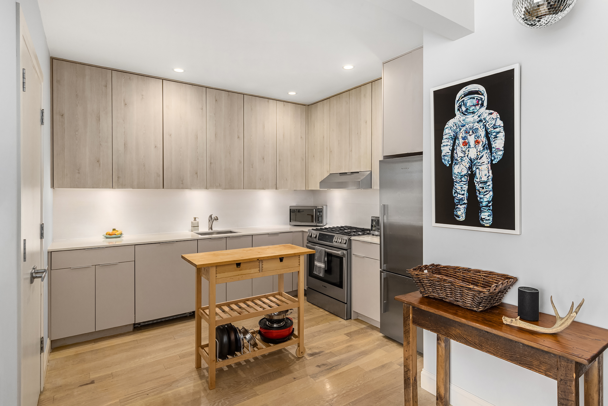 664 Jefferson Avenue, Unit 2R Brooklyn, NY 11221 - Photo 3 of 10 a kitchen with stainless steel appliances granite countertop a stove and a sink