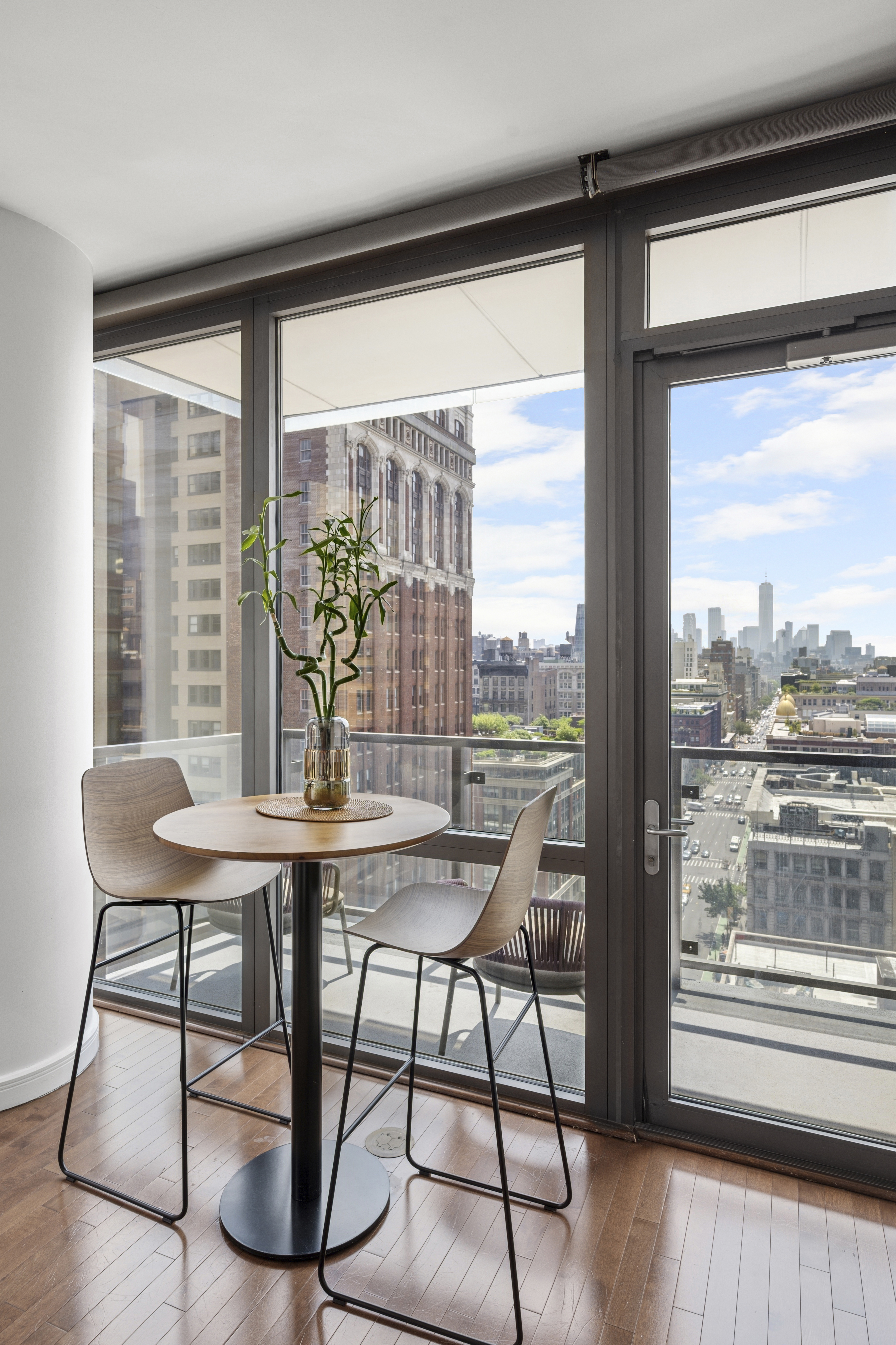 101 West 24th Street, Unit 16D Manhattan, NY 10011 - Photo 2 of 23 a view of a room with a table and chairs