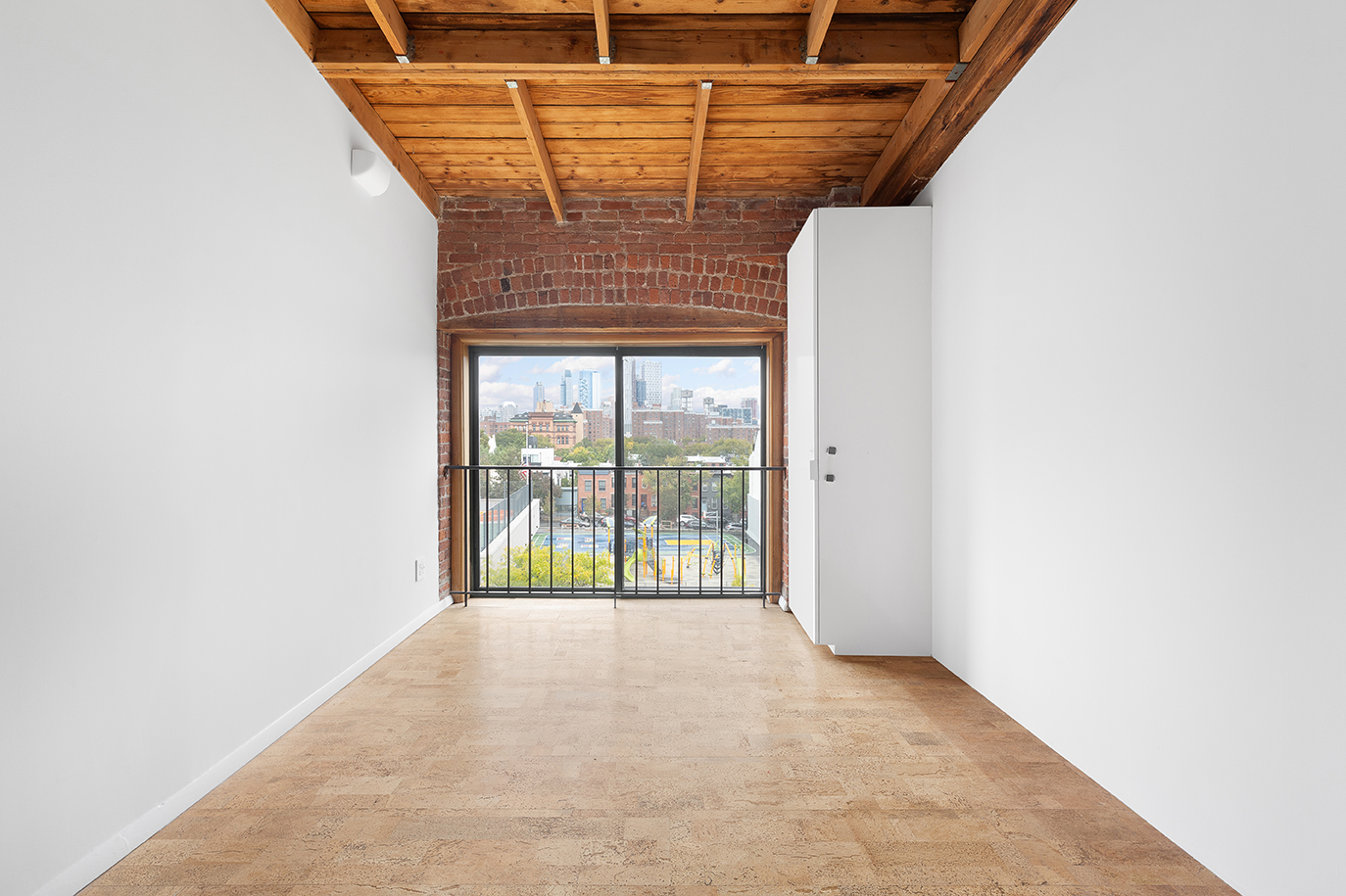 376 President Street, Unit 4D Brooklyn, NY 11231 - Photo 7 of 18 a view of empty room with floor to ceiling window