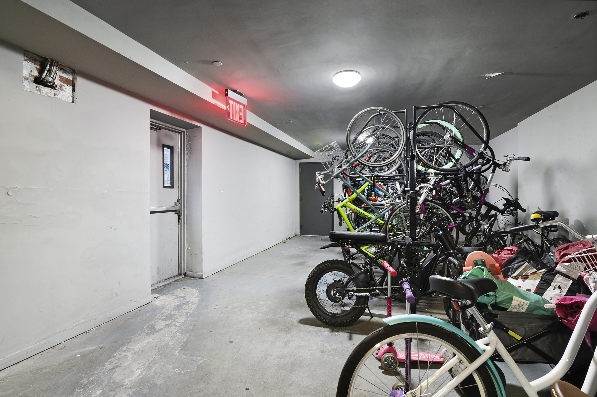 180 Bainbridge Street, Unit 111 Brooklyn, NY 11233 - Photo 23 of 25 a view of a bike storage and utility room