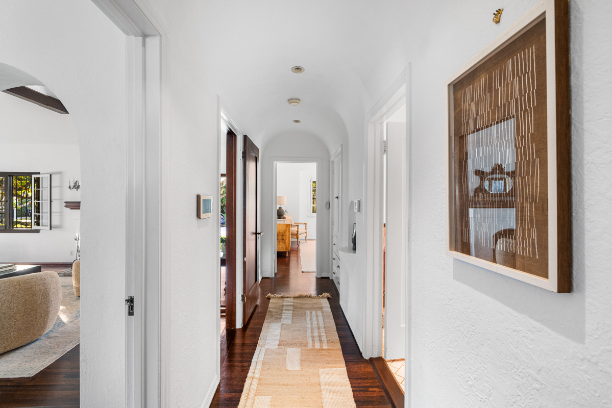 926 Burnside Avenue Los Angeles, CA 90036 - Photo 24 of 71 a view of a hallway with a livingroom and a bathroom with sink