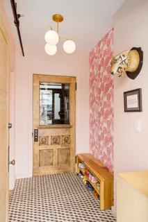 a very nice looking room with cabinets