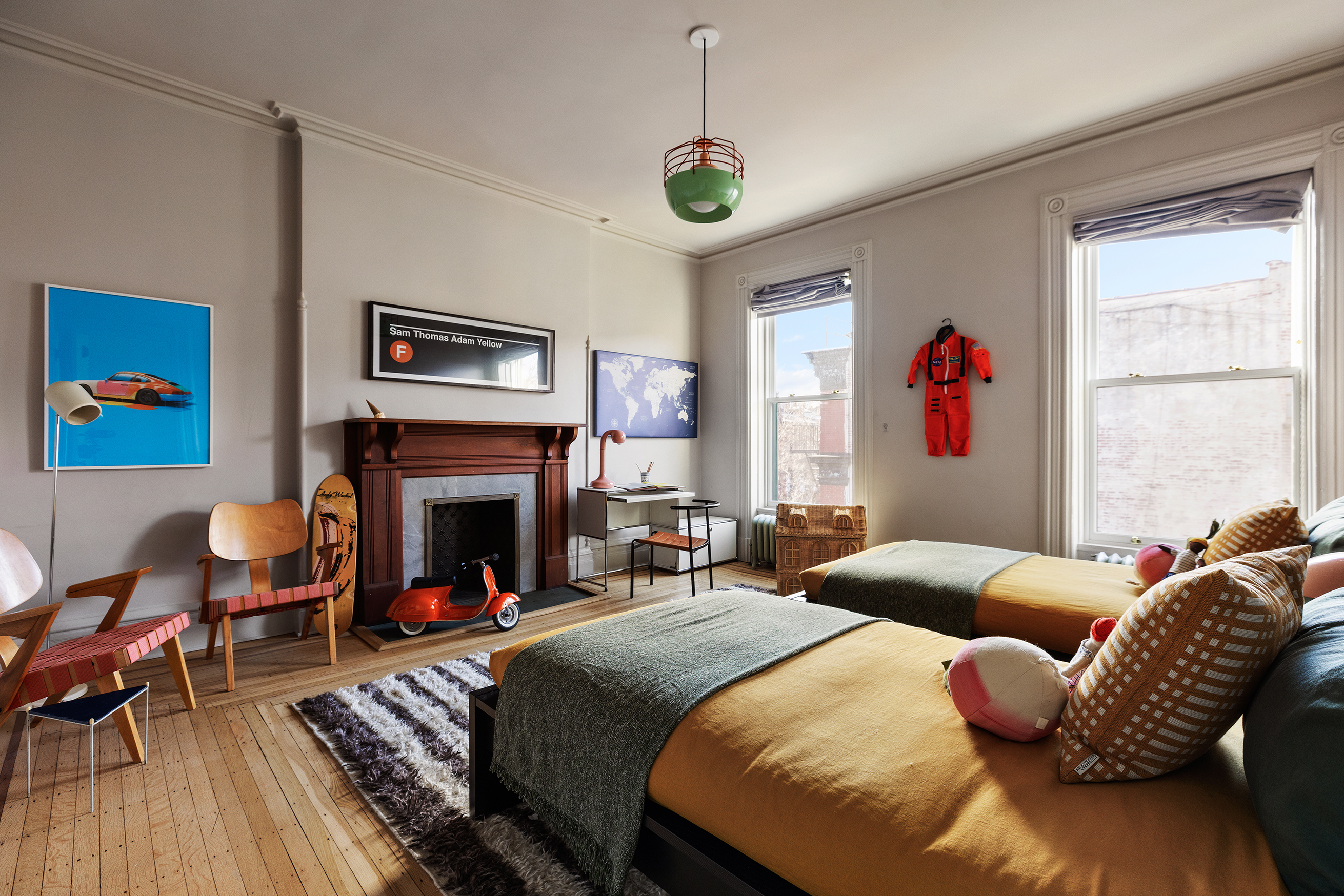 234 Clinton Street Brooklyn, NY 11201 - Photo 13 of 19 a bedroom with a bed and a fireplace