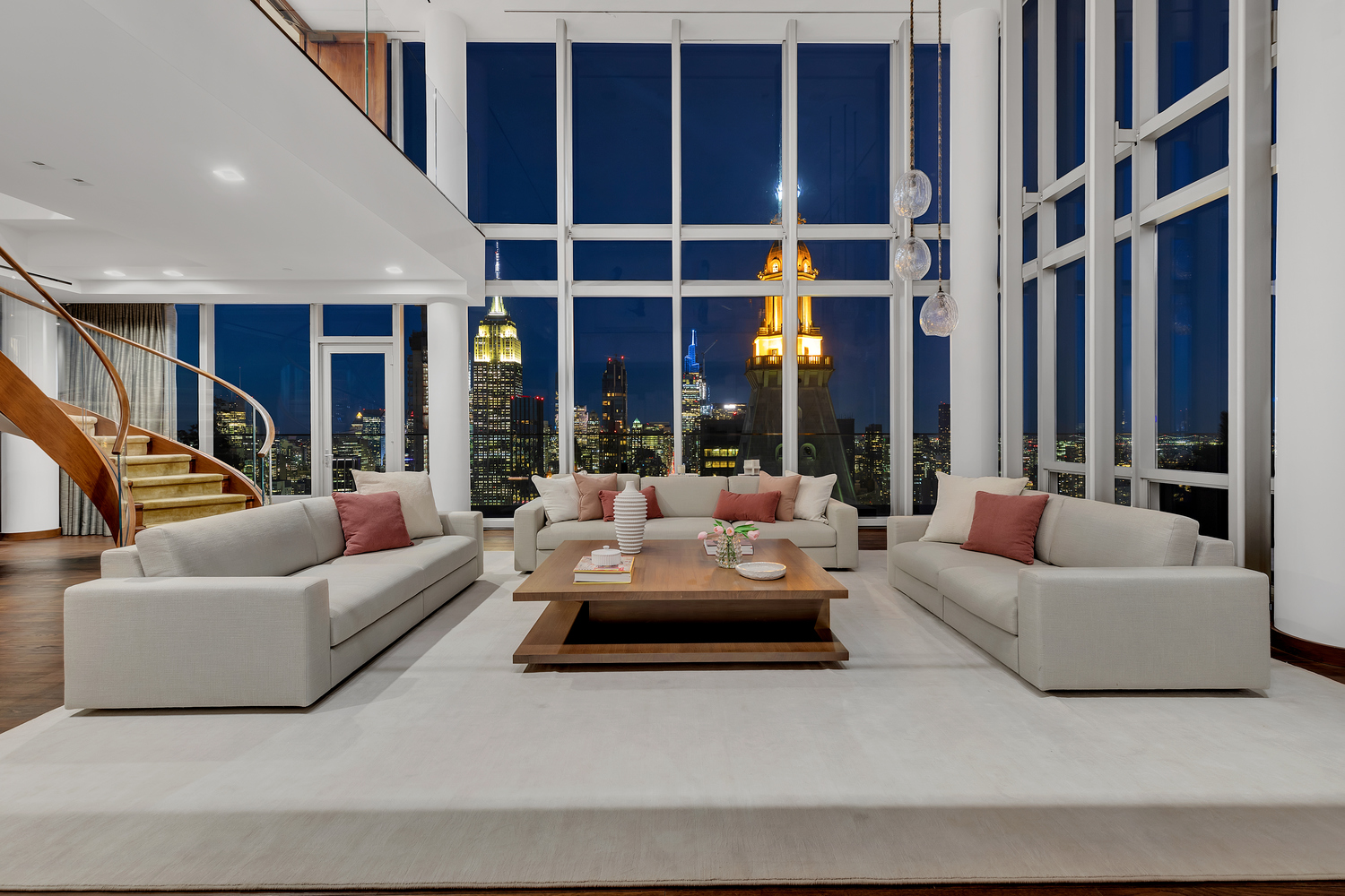 23 East 22nd Street, Unit PH Manhattan, NY 10010 - Photo 4 of 32 a living room with furniture and large windows