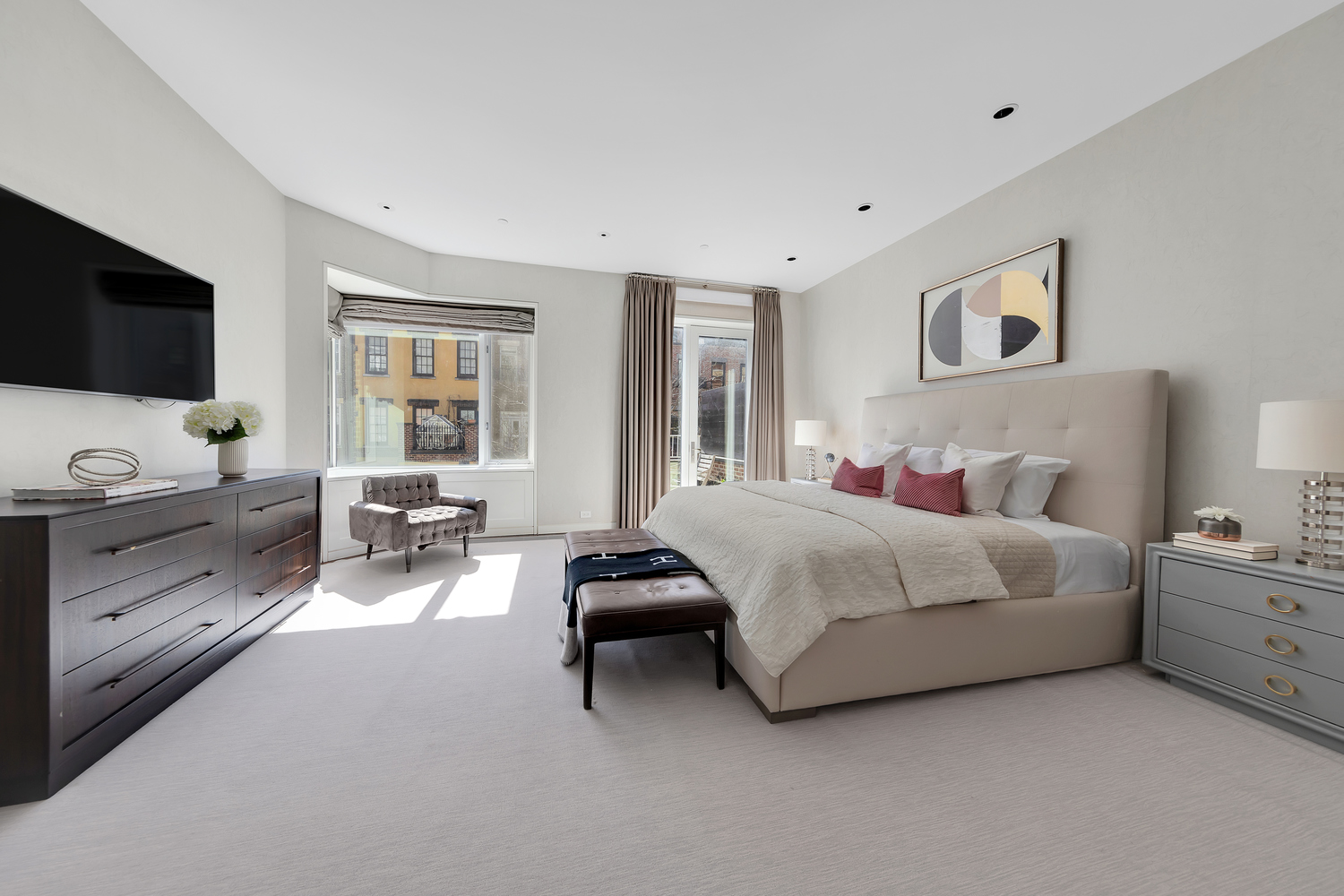 42 West 71st Street Manhattan, NY 10023 - Photo 20 of 35 a spacious bedroom with a bed and furniture