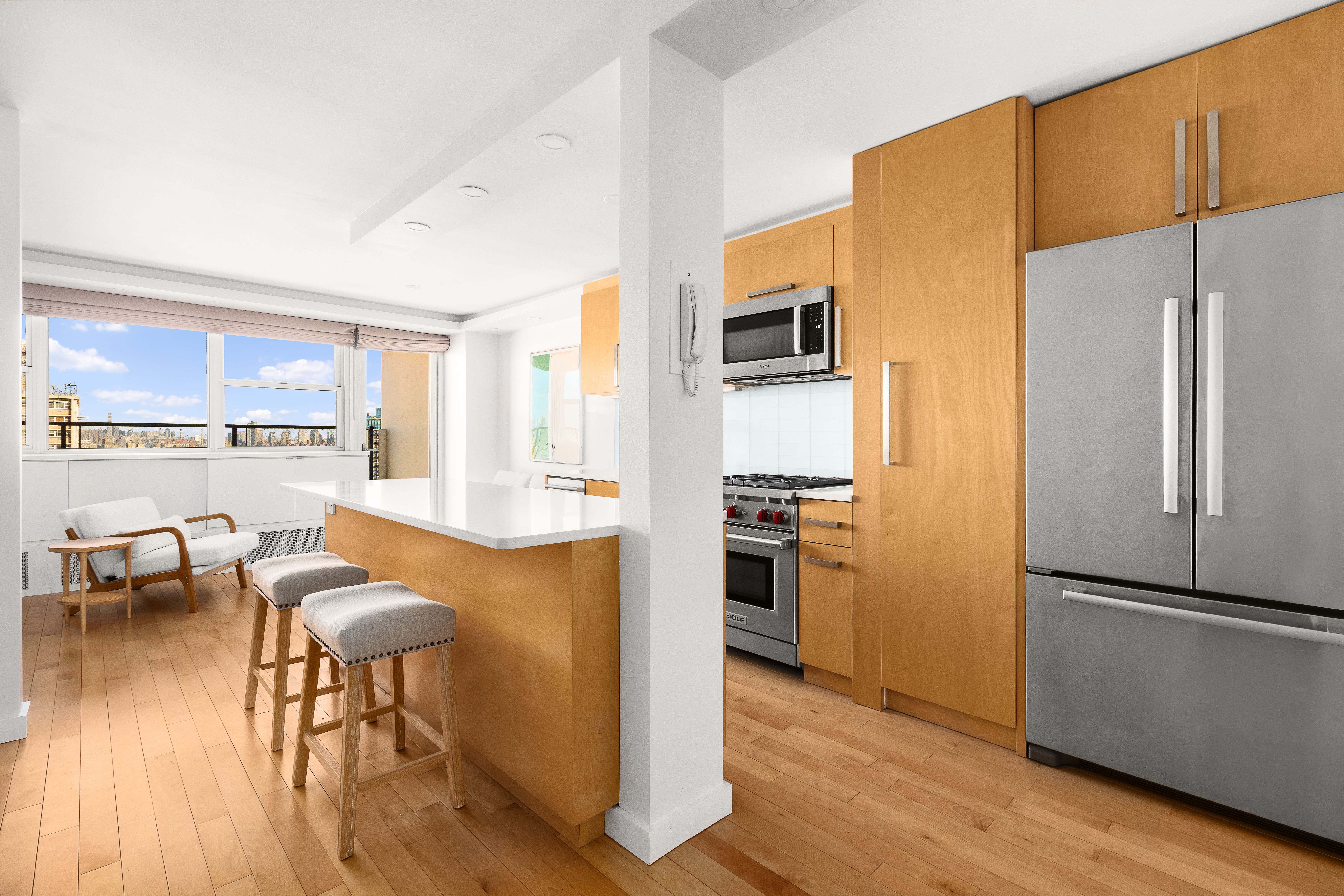 75 Henry Street, Unit 23D Brooklyn, NY 11201 - Photo 2 of 8 a kitchen with stainless steel appliances granite countertop a refrigerator and a stove top oven