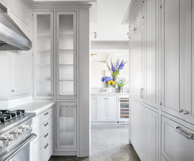a kitchen with stainless steel appliances a stove and a refrigerator