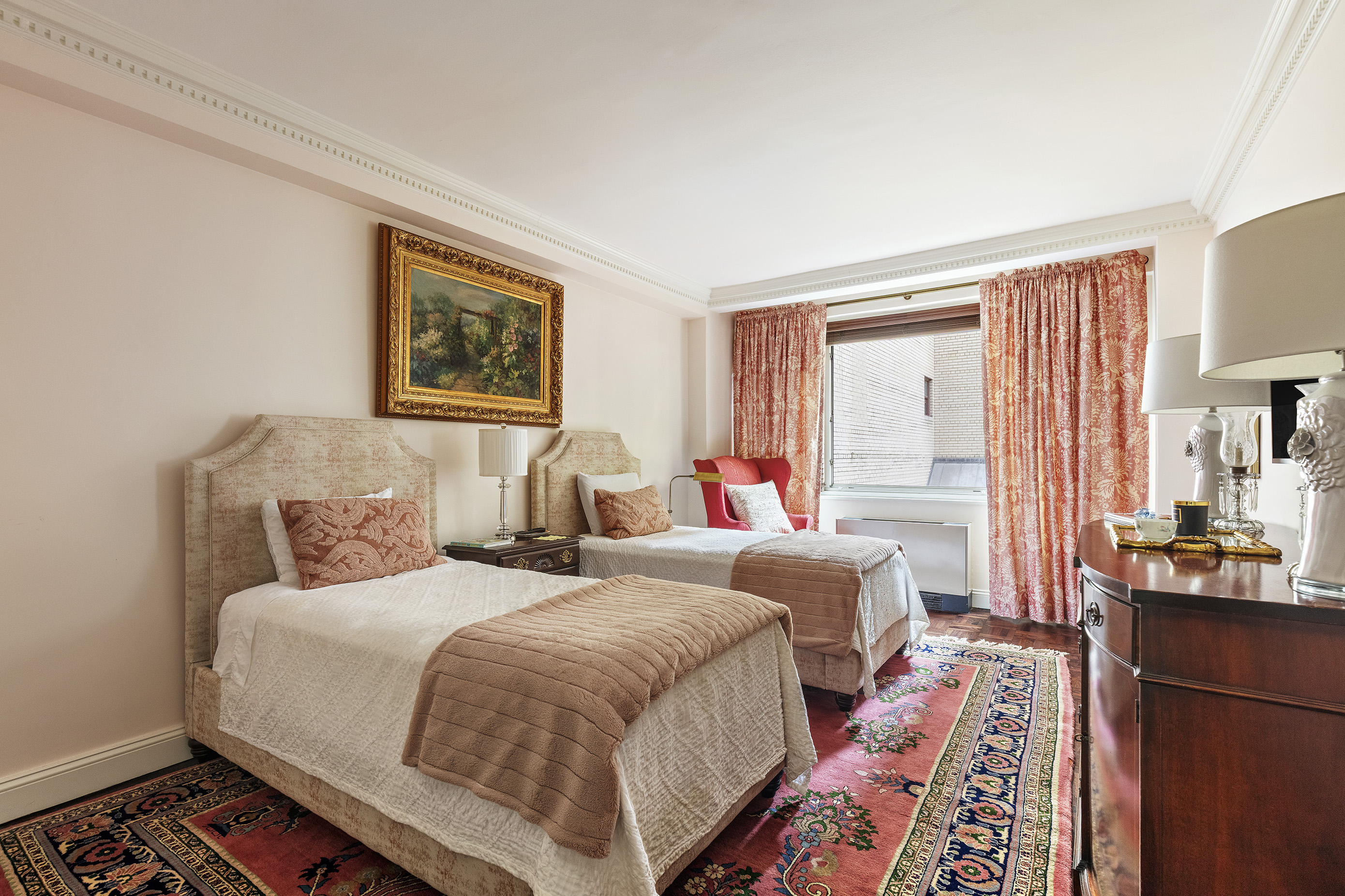 10 East 70th Street, Unit 3A Manhattan, NY 10021 - Photo 8 of 18 a bedroom with bed and a window