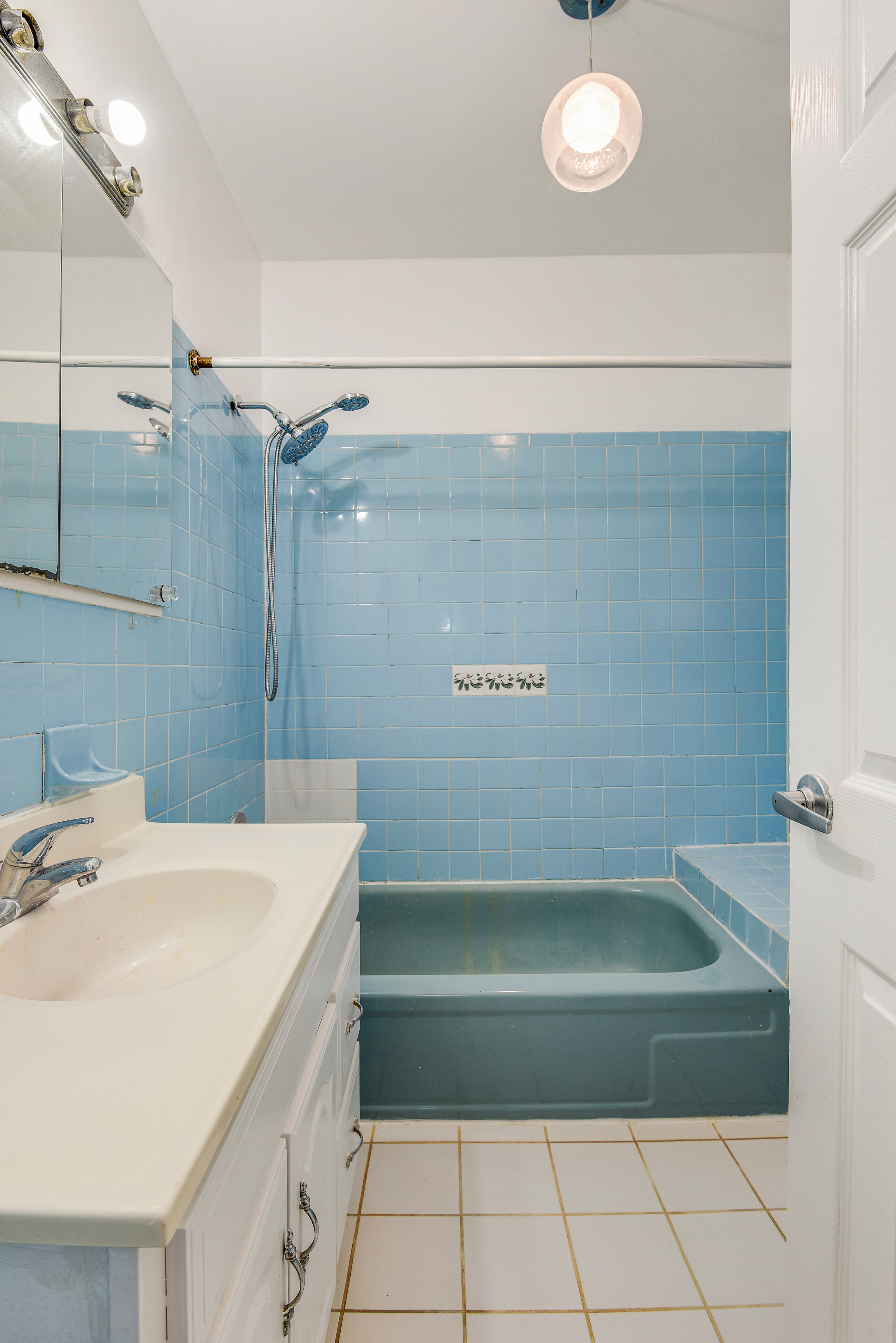 35-47 30th Street, Unit 1 Queens, NY 11106 - Photo 13 of 15 a bathroom with a bathtub and a shower