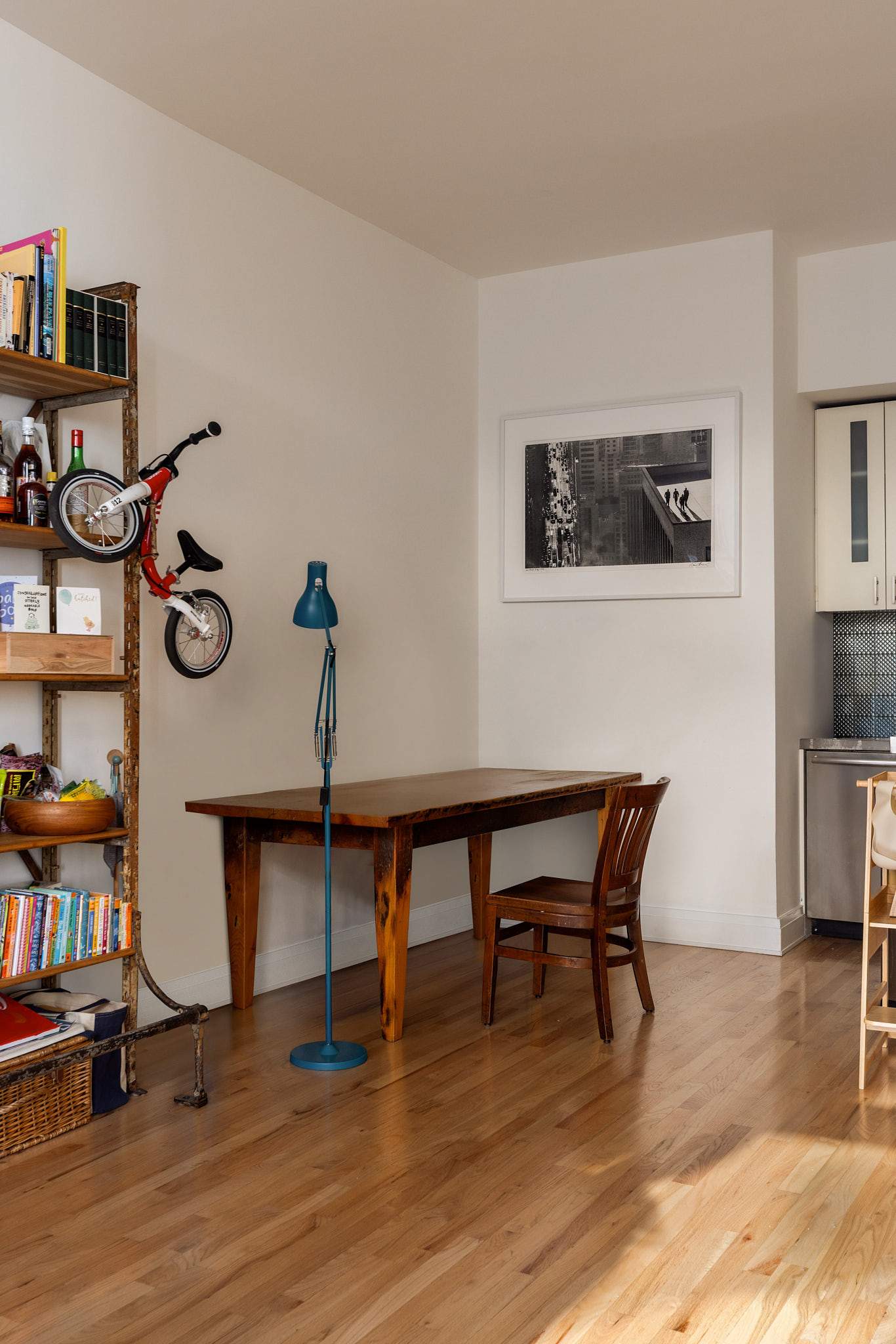124 West 24th Street, Unit 4A Manhattan, NY 10011 - Photo 4 of 13 a view of a work space with furniture and wooden floor