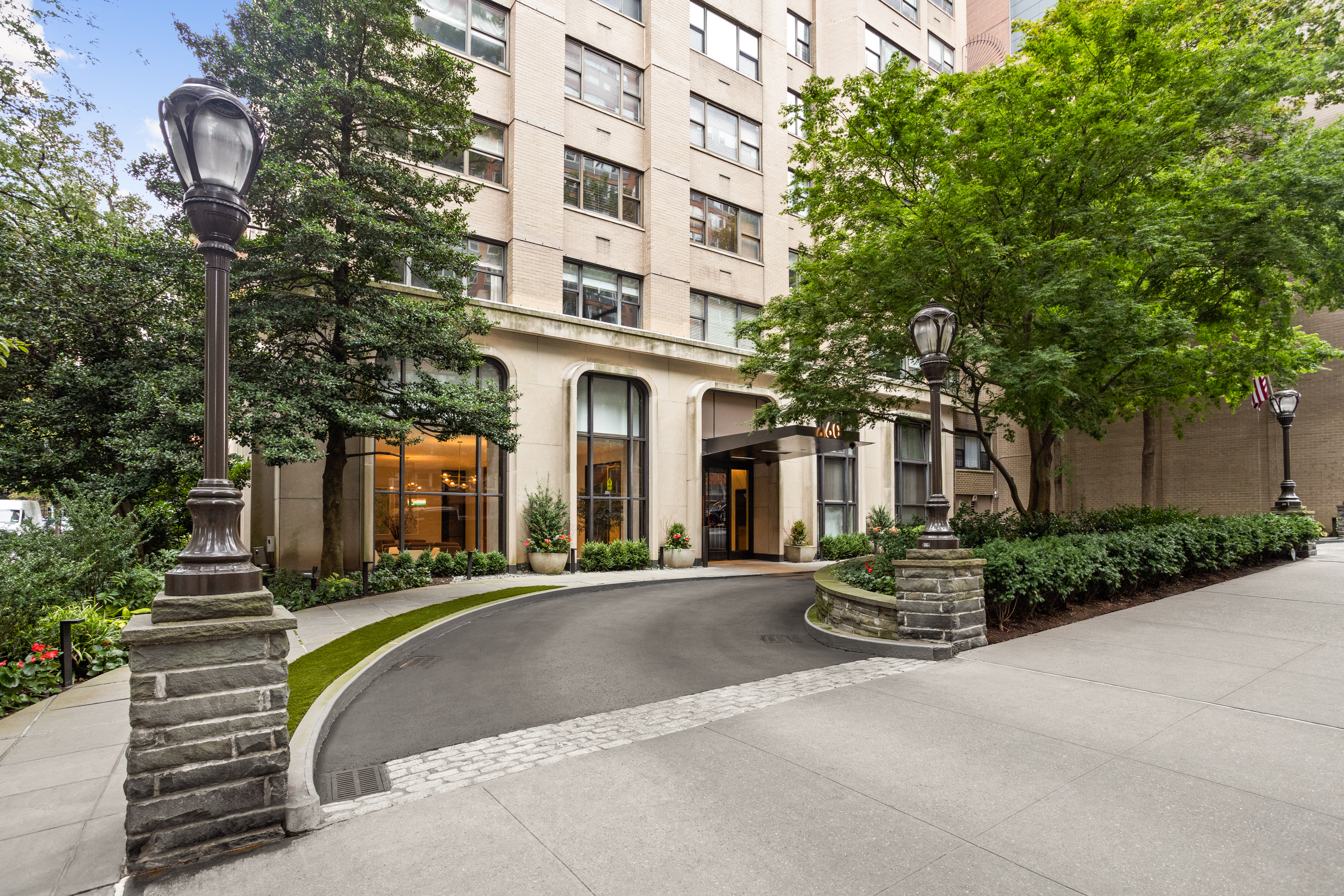 60 East End Avenue, Unit 12C Manhattan, NY 10028 - Photo 26 of 27 a view of a building with a street