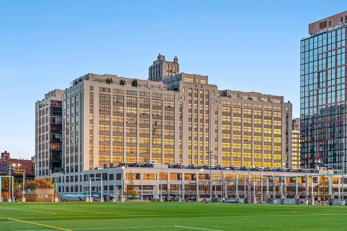 360 Furman Street, Unit 202 Brooklyn, NY 11201 - Photo 18 of 55 a front view of a building with a garden
