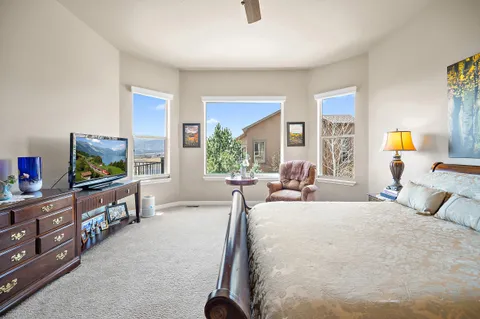 a living room with furniture fireplace and a flat screen tv