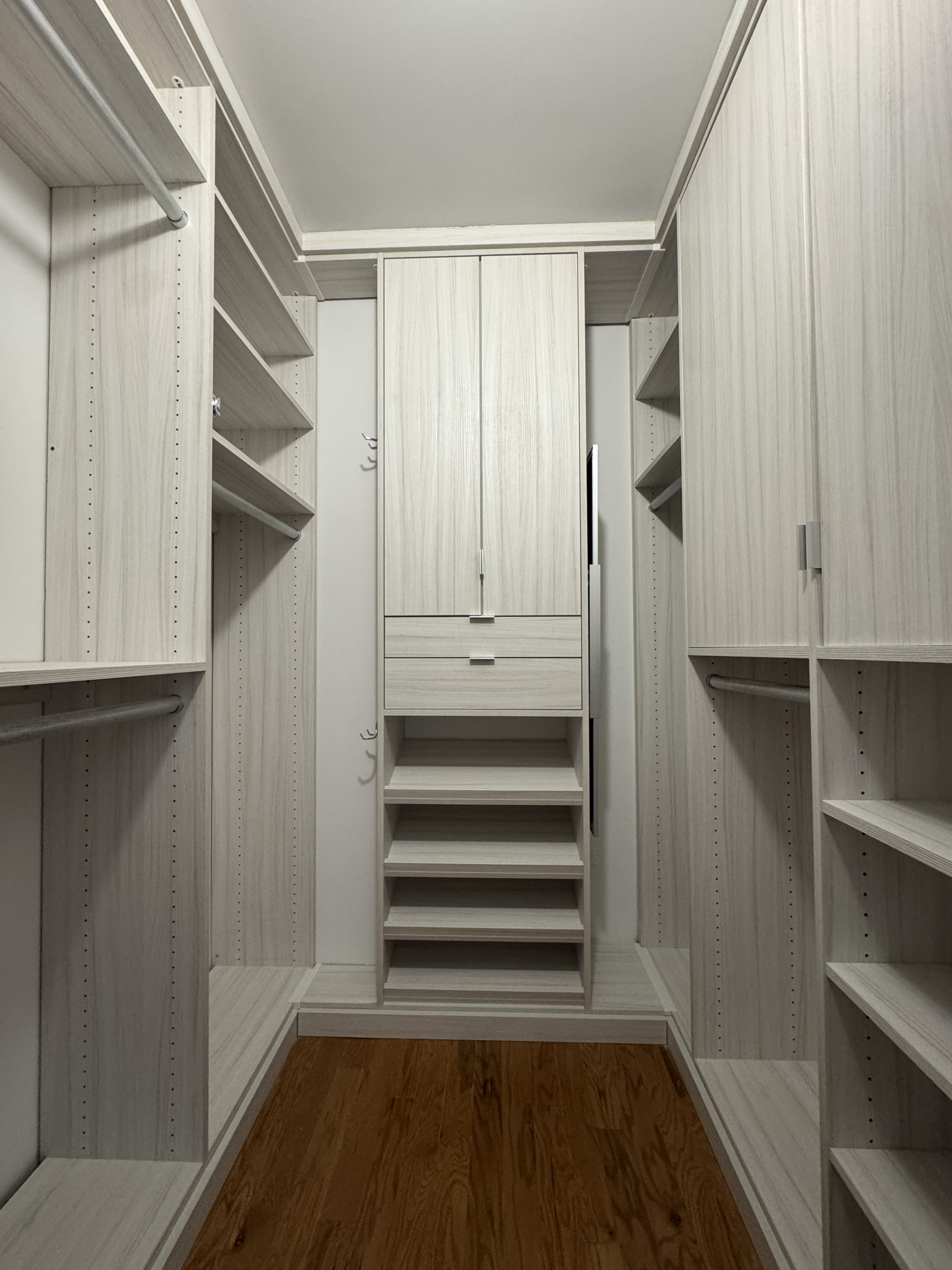 2 South End Avenue, Unit 8E Manhattan, NY 10280 - Photo 9 of 16 a view of walk in closet with empty racks
