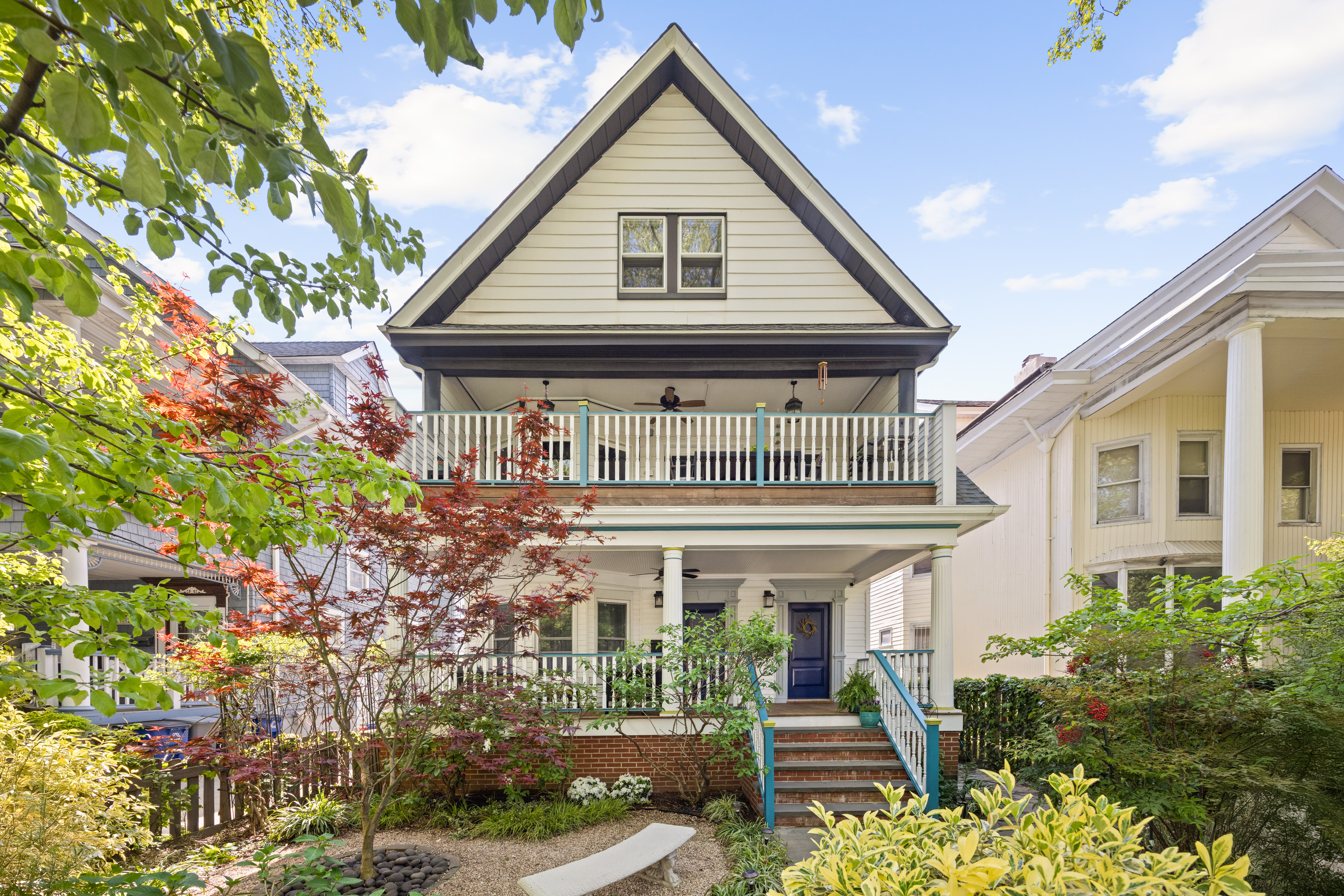 a front view of house along with street