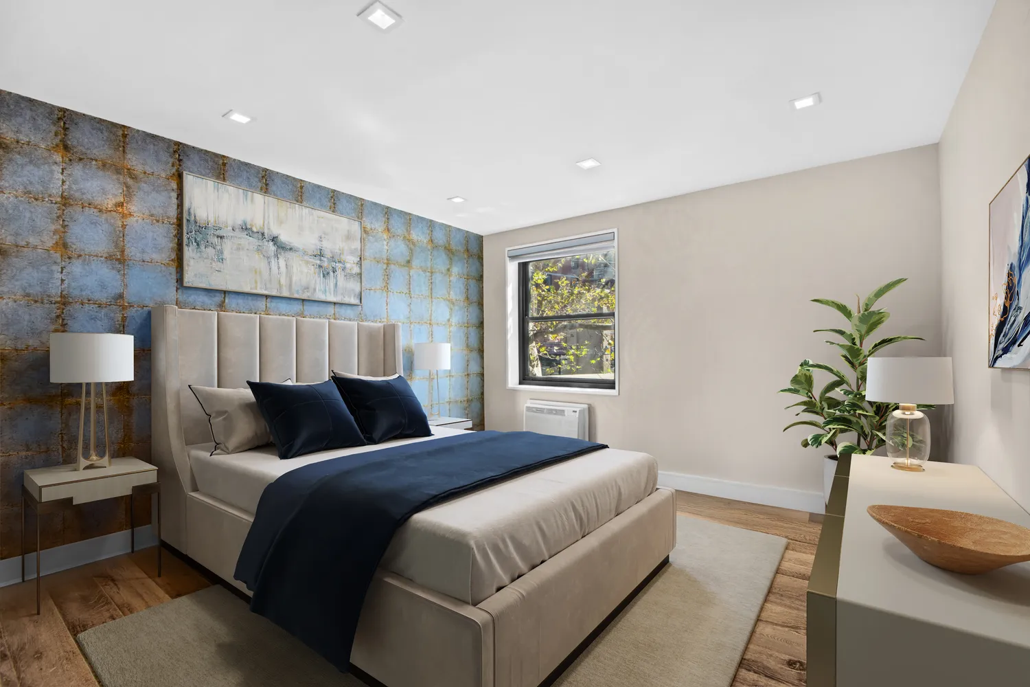 a bedroom with bed and a potted plant