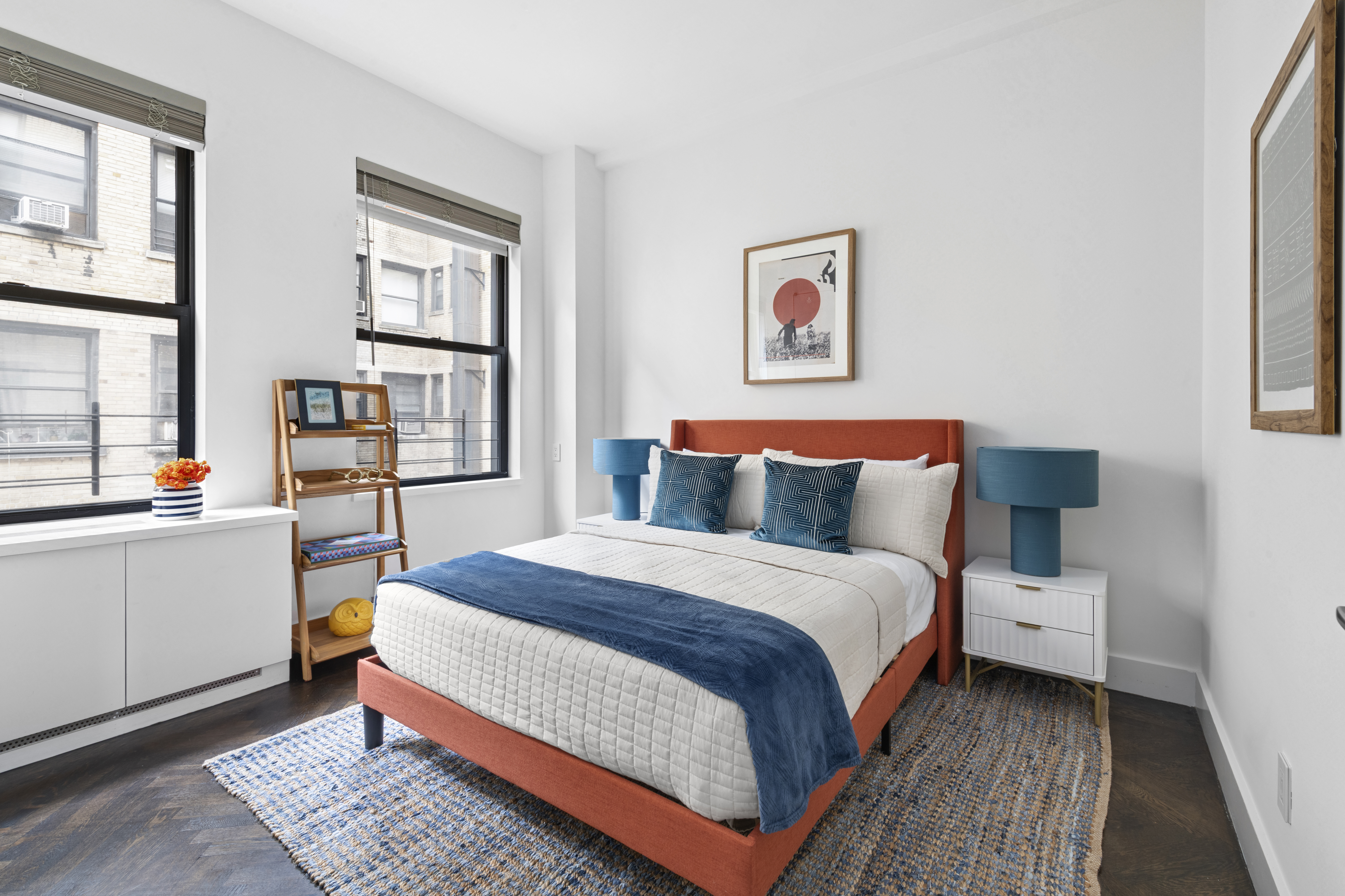 215 West 90th Street, Unit 10A Manhattan, NY 10024 - Photo 9 of 14 a bedroom with a bed and wooden floor