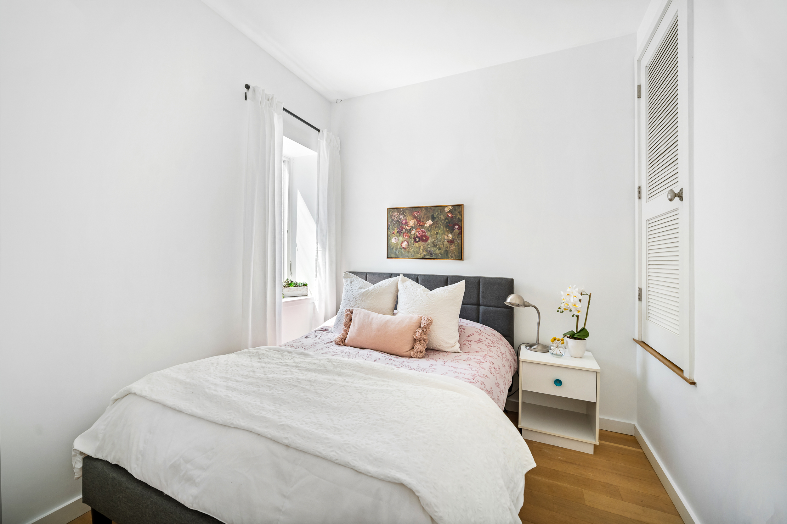 65 Jackson Street Brooklyn, NY 11211 - Photo 19 of 36 a bedroom with a bed and a window