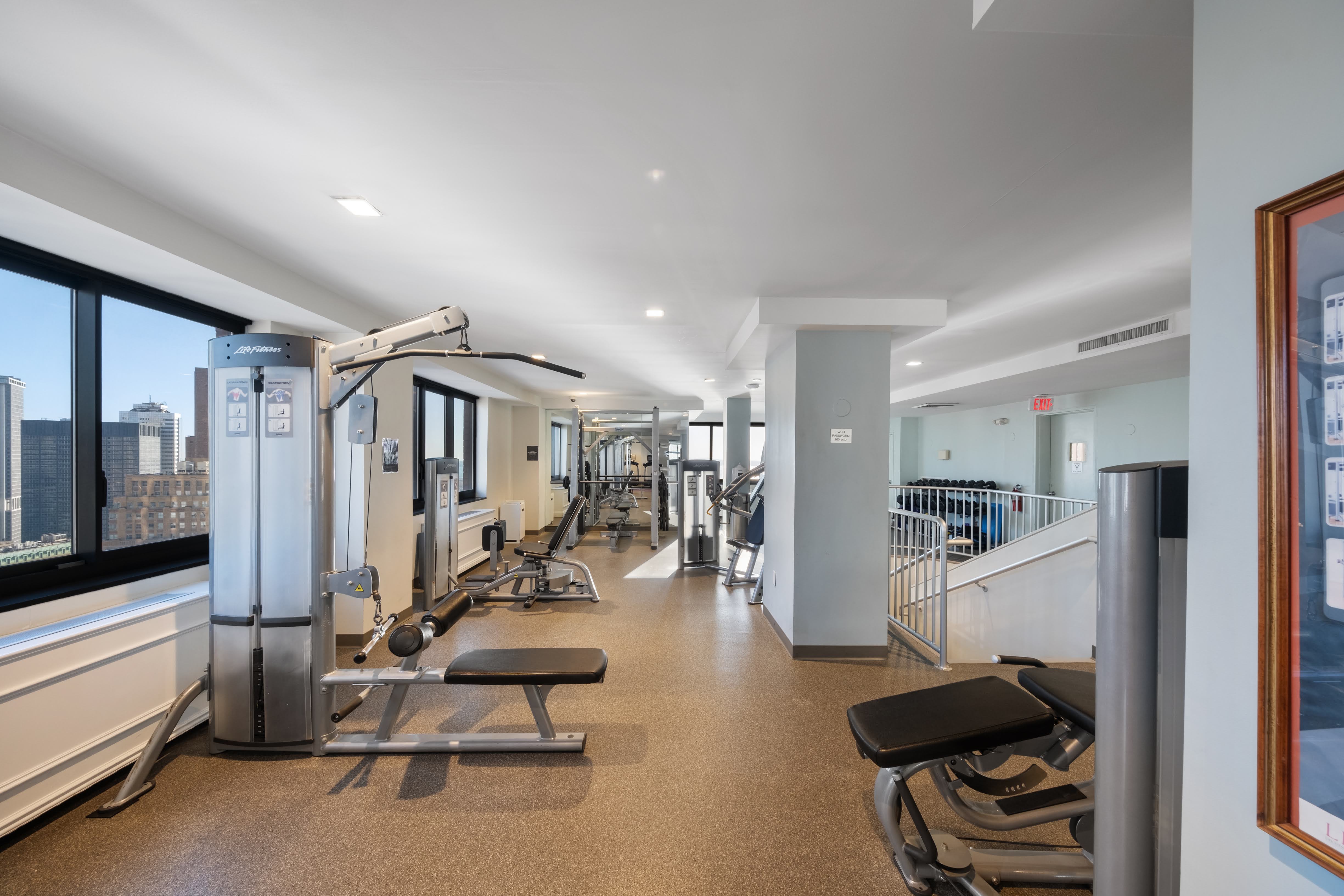 200 Rector Place, Unit 16F Manhattan, NY 10280 - Photo 11 of 25 a view of a room with gym equipment