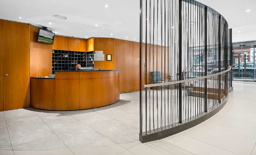 251 East 32nd Street, Unit 5J Manhattan, NY 10016 - Photo 12 of 15 a view of a living room and staircase
