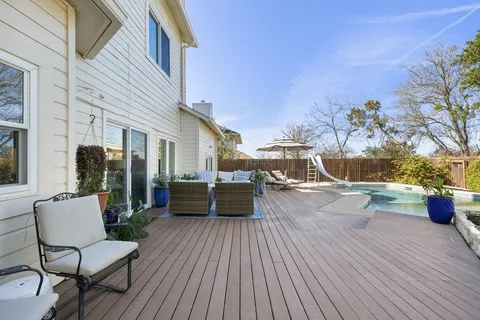 a view of a terrace with seating area