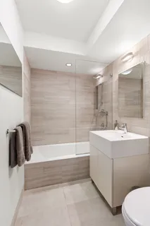 a bathroom with a sink and a bathtub