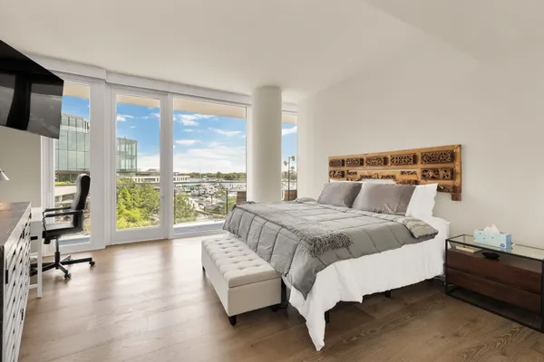 a bathroom with a shower and a glass door