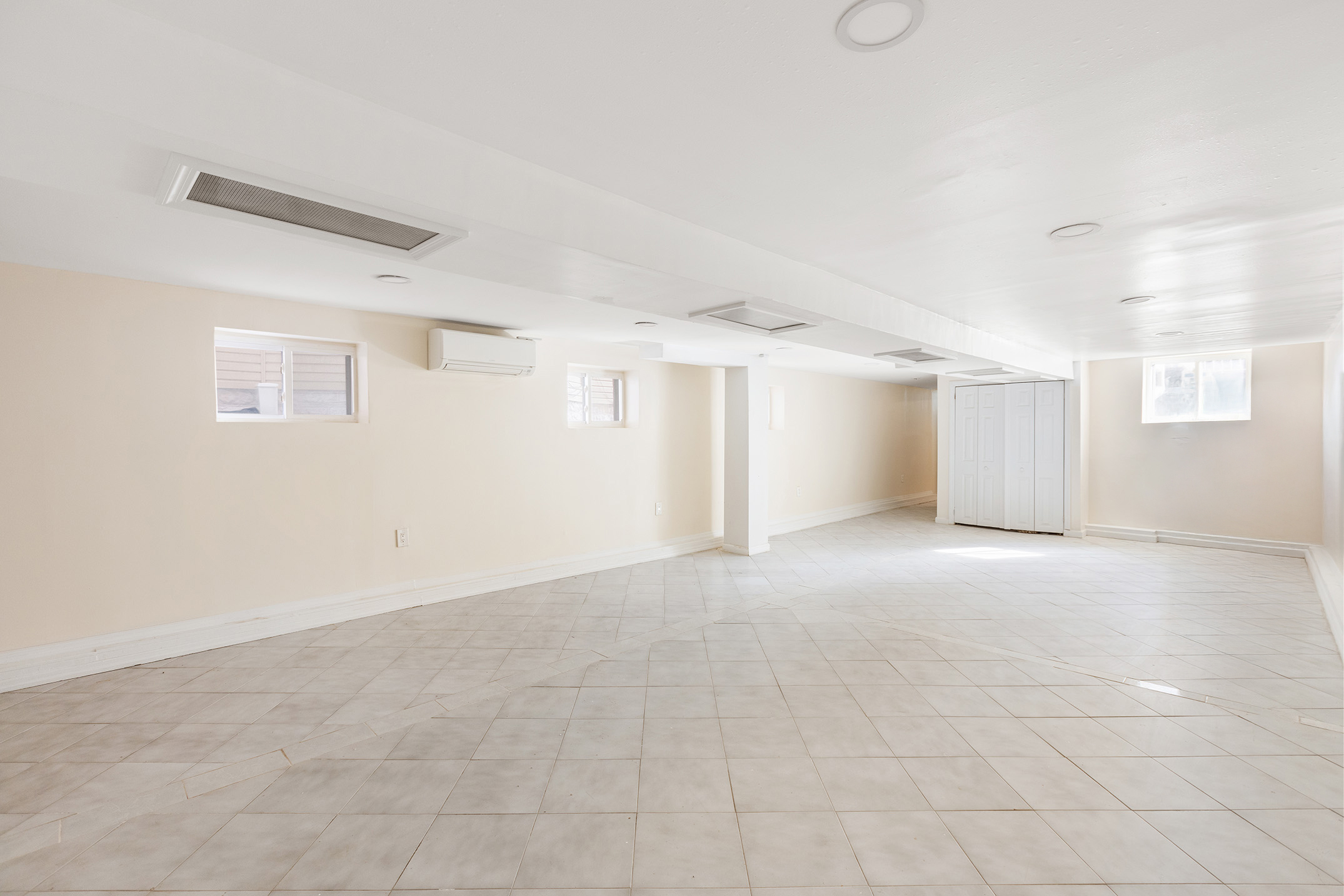 2773 Bedford Avenue Brooklyn, NY 11210 - Photo 14 of 17 an empty room with a empty space and windows