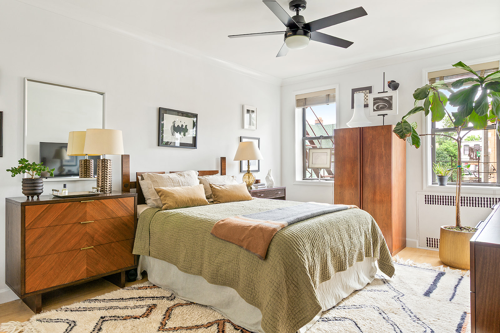 811 Cortelyou Road, Unit 2L Brooklyn, NY 11218 - Photo 6 of 10 a bedroom with a bed dresser and window