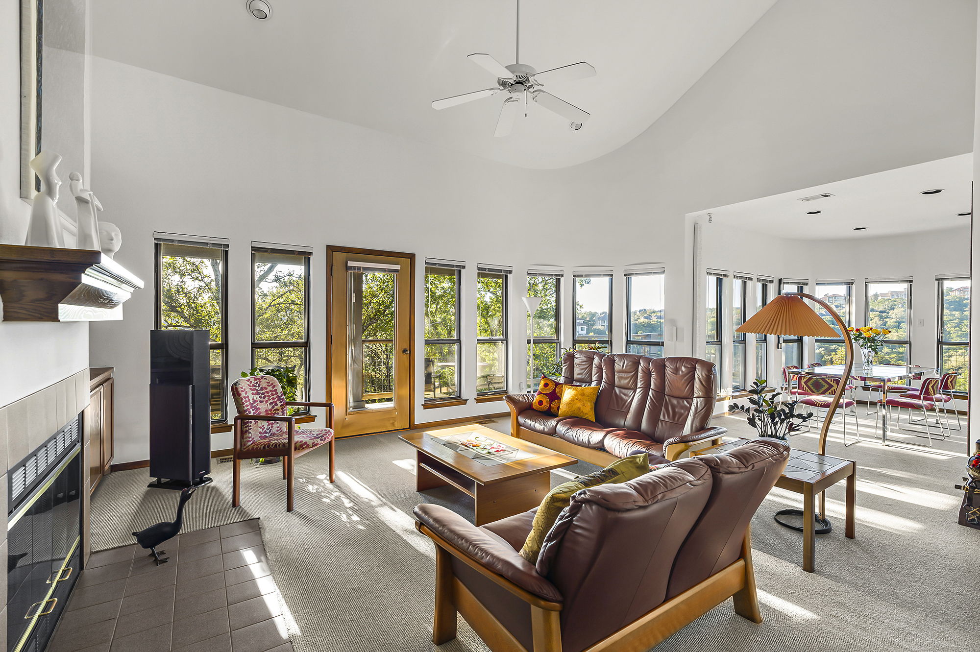 1605 The High Road Austin, TX 78746 - Photo 5 of 45 a living room with furniture and a floor to ceiling window
