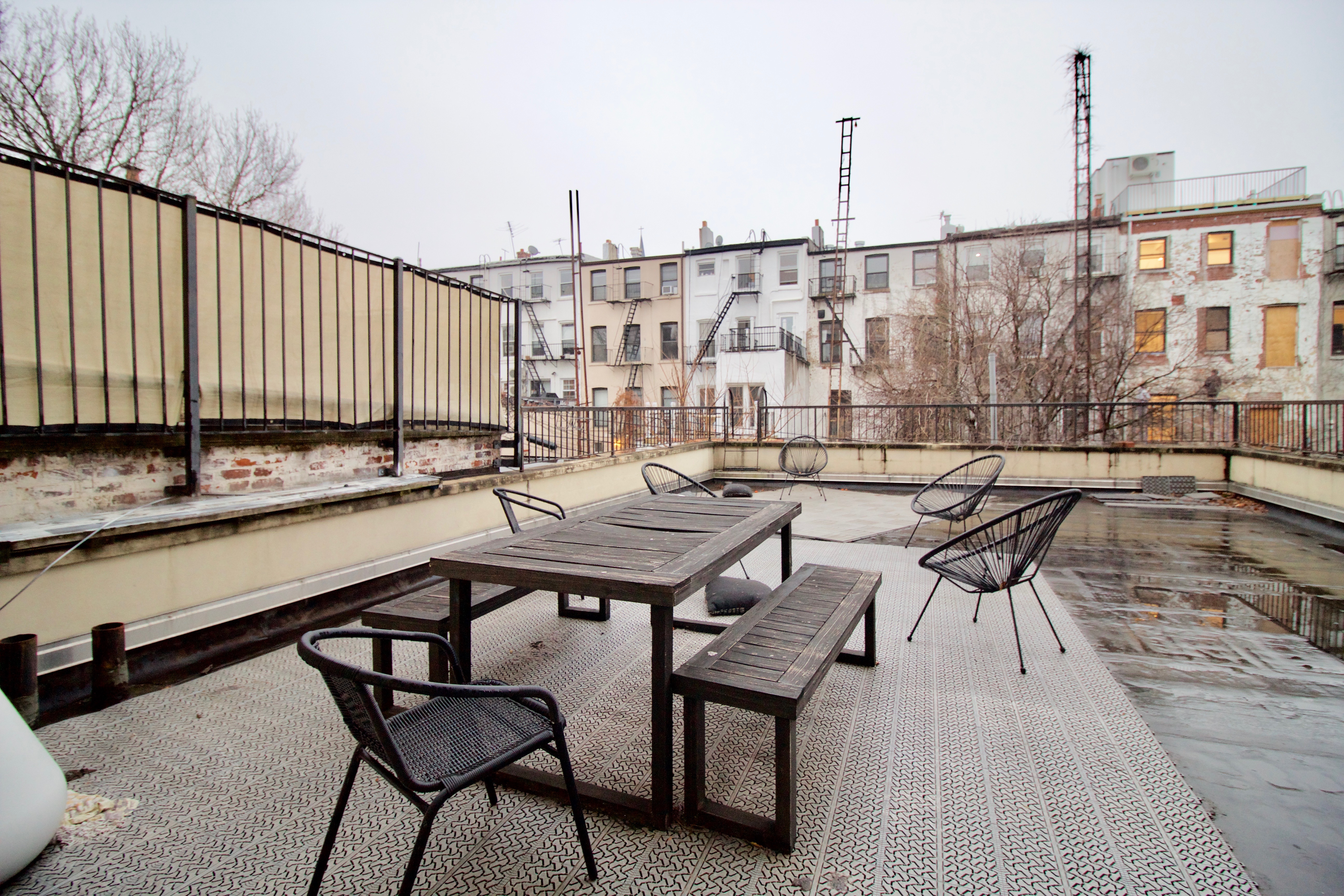 134 Union Street, Unit 2R Brooklyn, NY 11231 - Photo 13 of 23 a terrace with outdoor seating and wooden floor