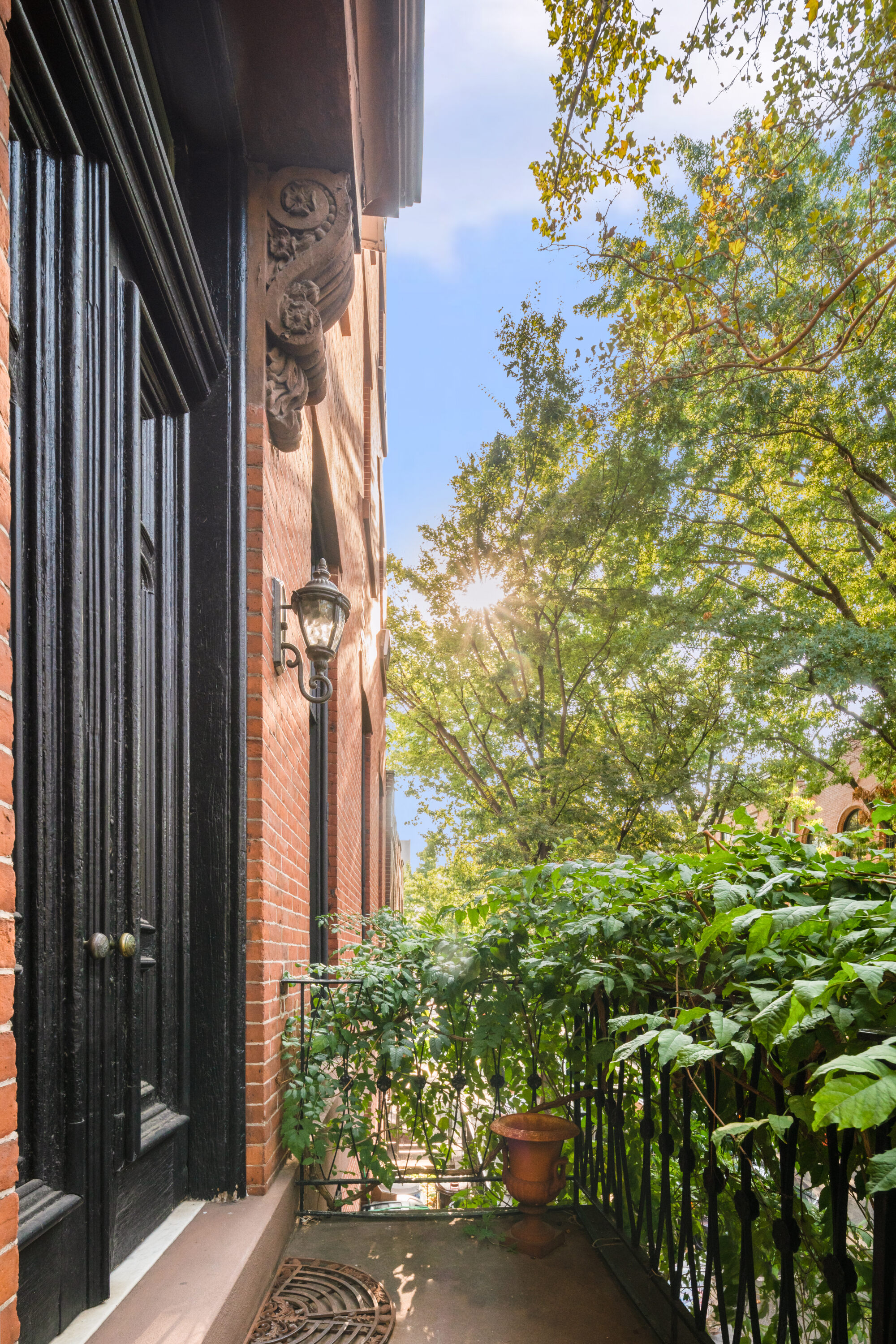 199 Clinton Street, Unit 2 Brooklyn, NY 11201 - Photo 3 of 17 a view of a house with a tree