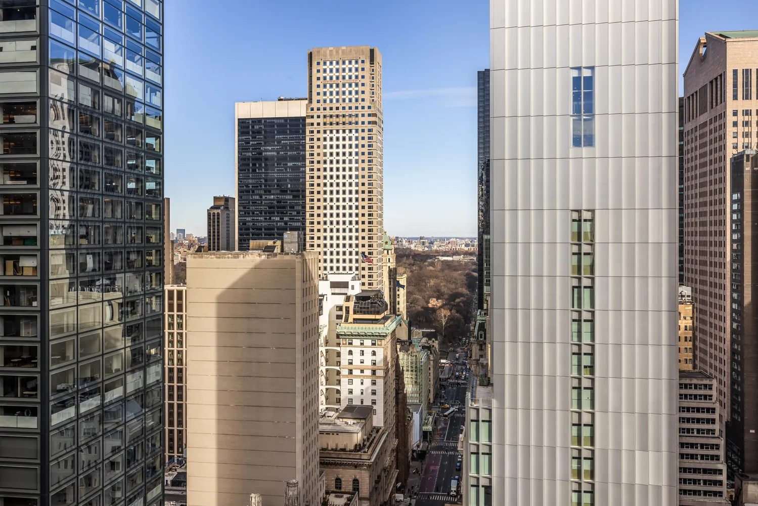 a view of a city with tall buildings