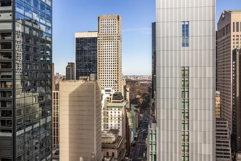 a view of a city with tall buildings