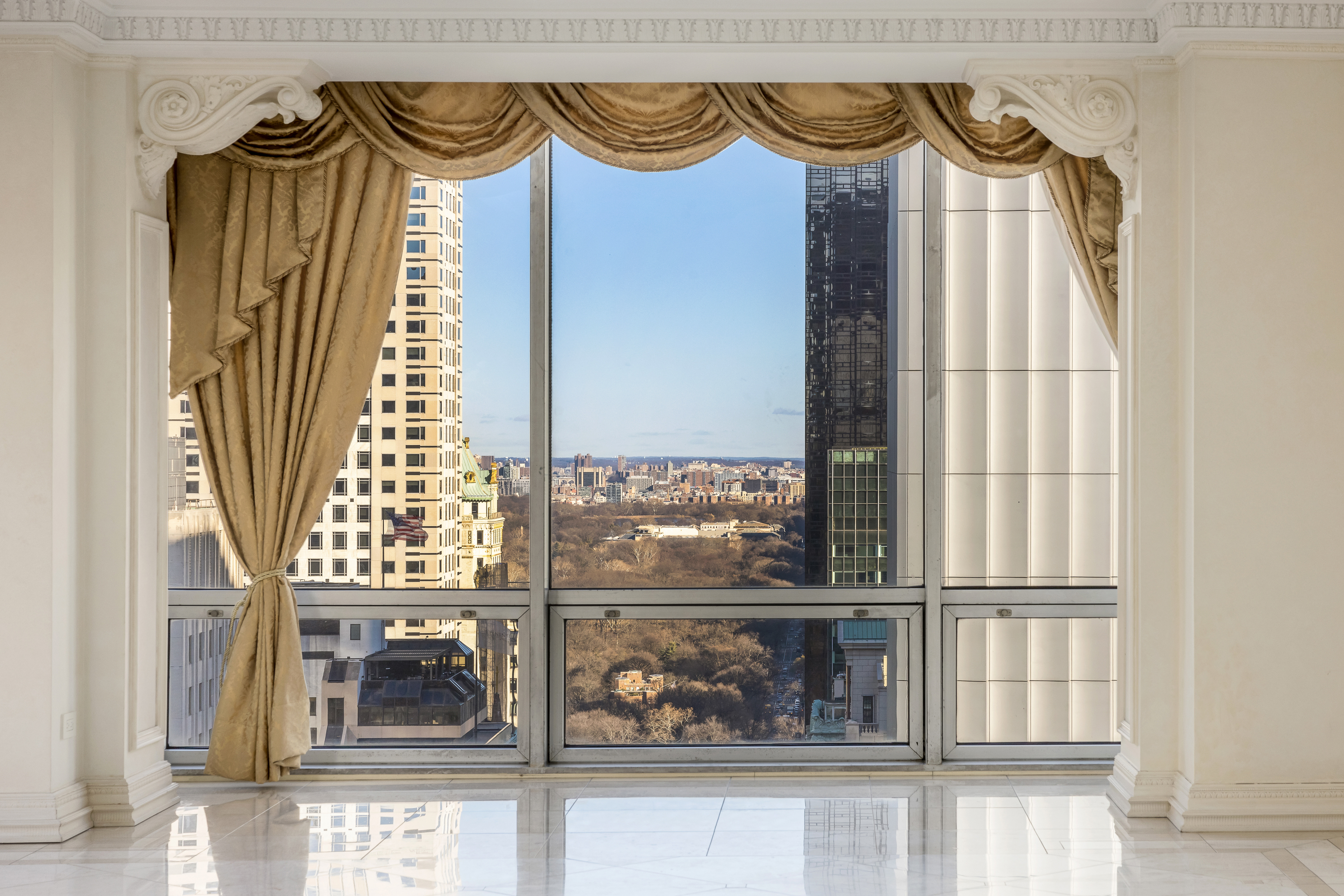 641 5th Avenue, Unit 27A Manhattan, NY 10022 - Photo 15 of 29 a bathroom with a sink and a mirror