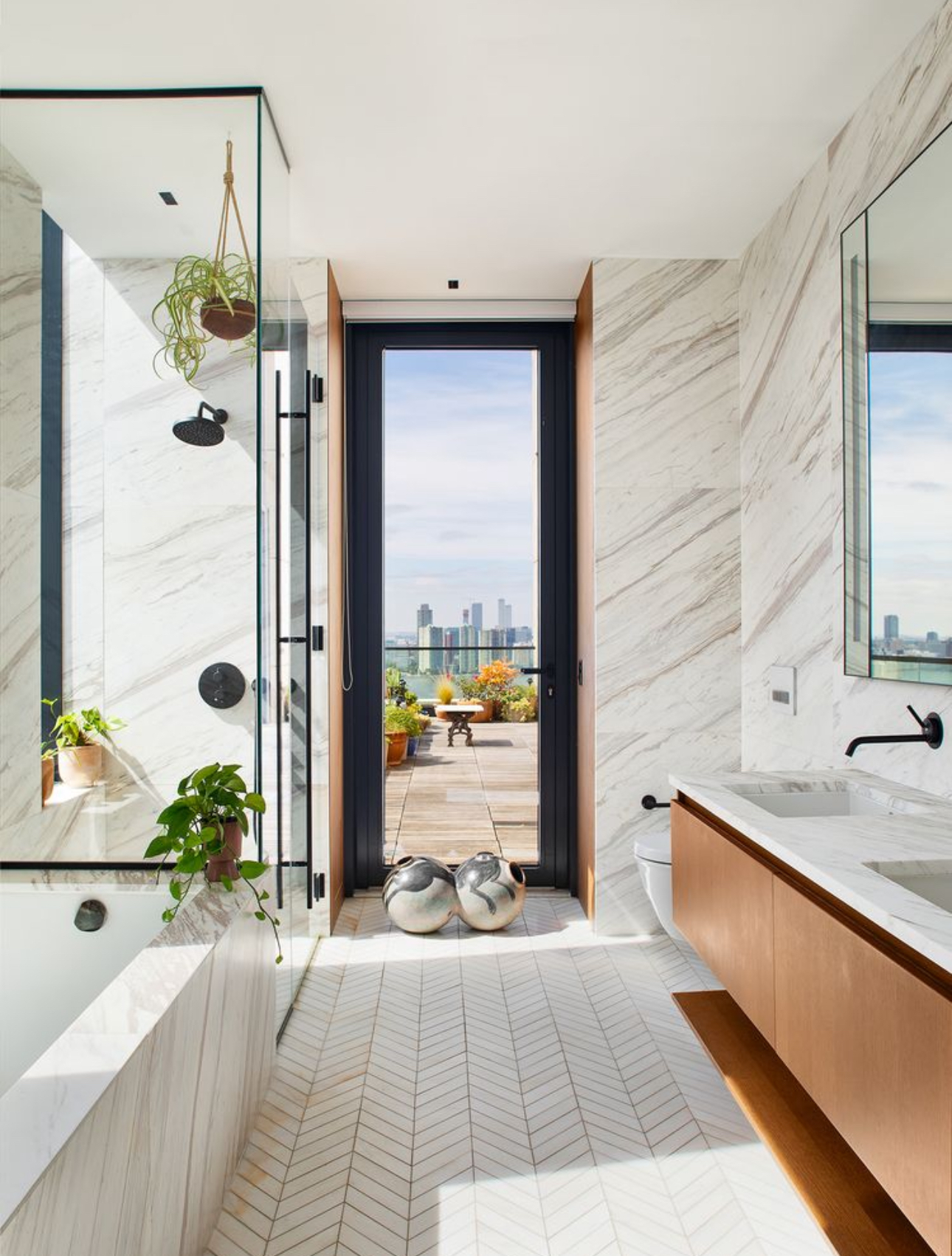 570 Broome Street, Unit PHA Manhattan, NY 10013 - Photo 11 of 22 a bathroom with a tub sink and shower