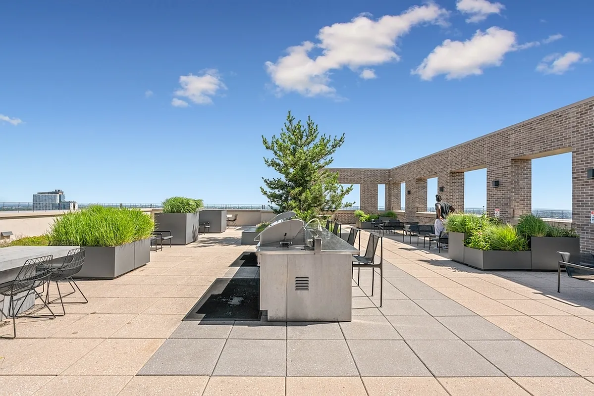 626 Flatbush Avenue, Unit 12D Brooklyn, NY 11225 - Photo 13 of 18 a view of a terrace with chairs potted plants with sky view