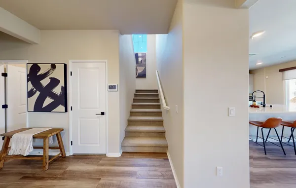 a view of a hallway with staircase