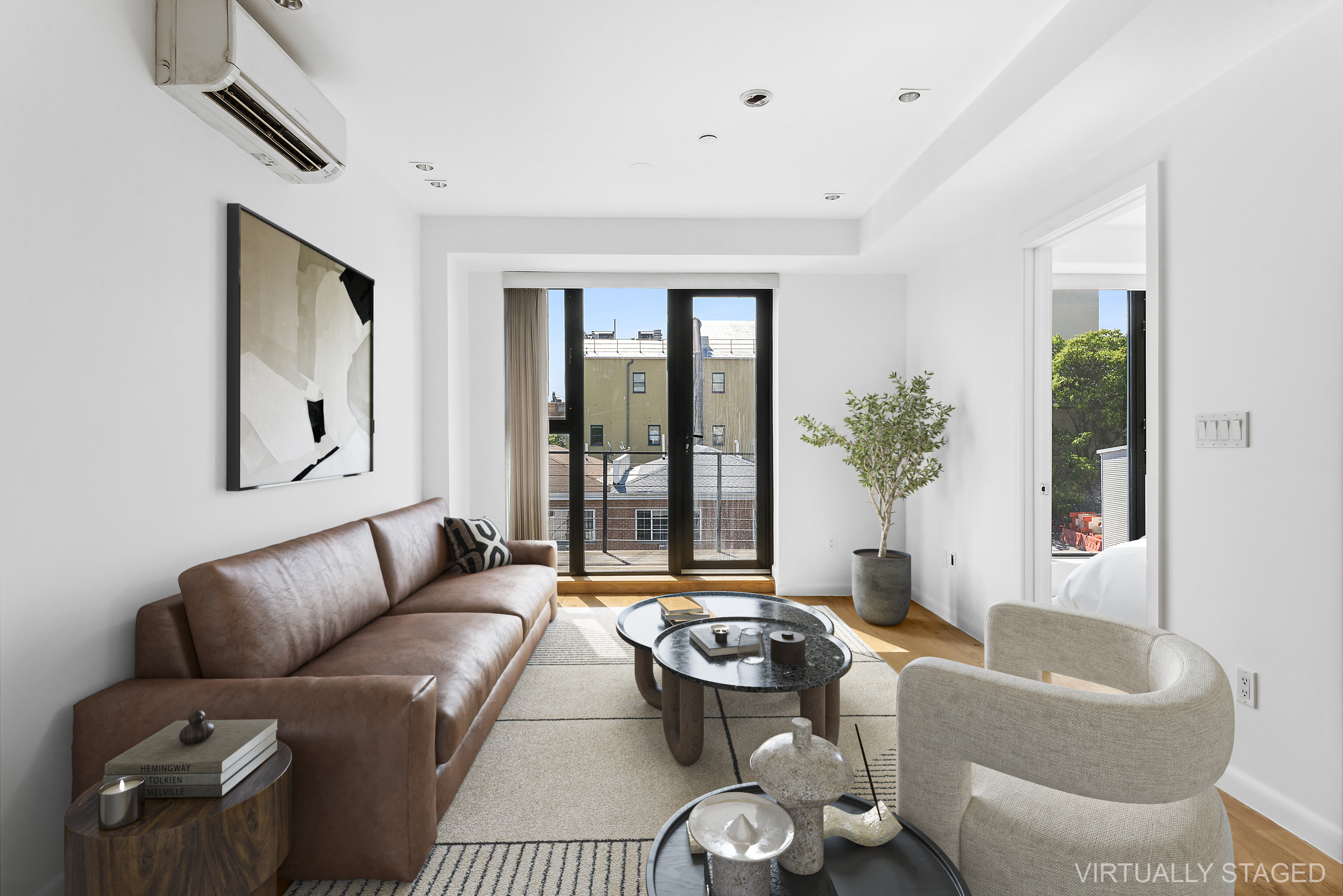 27 Dodworth Street, Unit PHF Brooklyn, NY 11221 - Photo 1 of 18 a living room with furniture and a large window