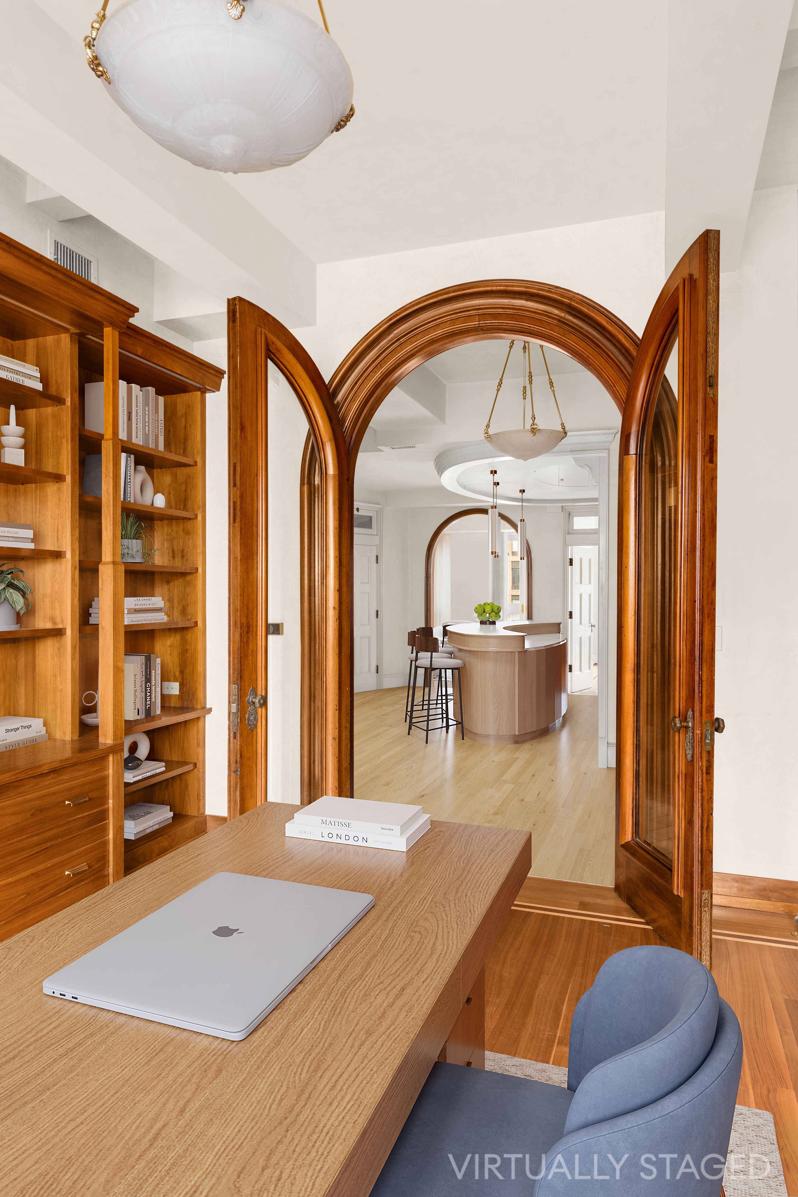 252 West 30th Street, Unit 12 Manhattan, NY 10001 - Photo 6 of 20 a living room with a bed furniture and a large window