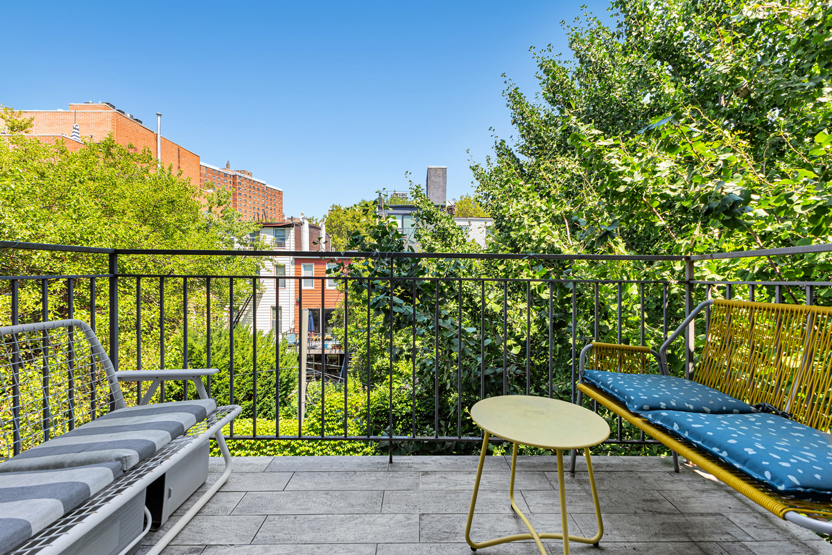 325 Greene Avenue, Unit 3B Brooklyn, NY 11238 - Photo 6 of 7 a view of a balcony with chairs