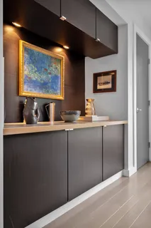 a bedroom with a bed and a lamp