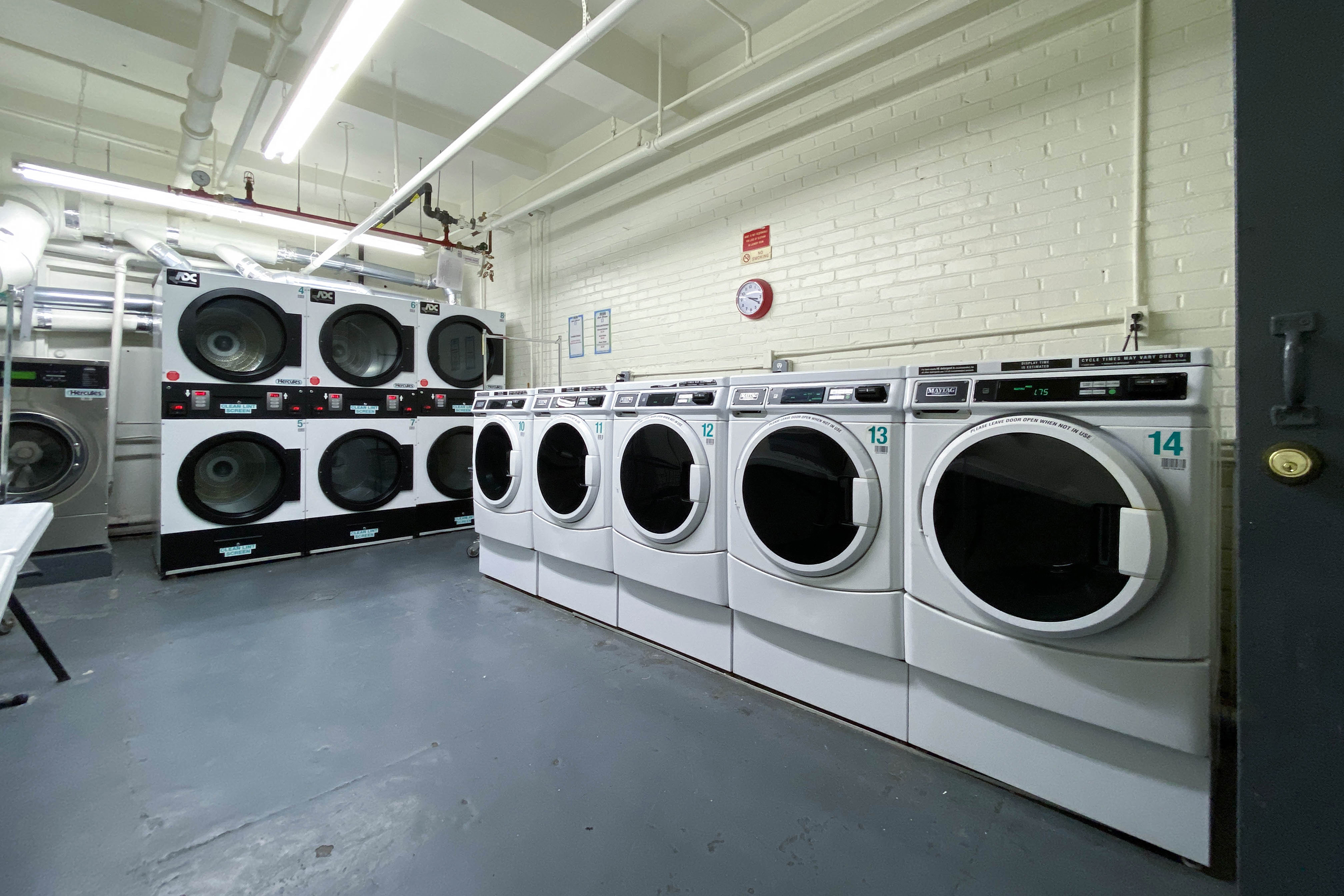467 Central Park West, Unit 2G Manhattan, NY 10025 - Photo 9 of 10 a utility room with dryer and washer