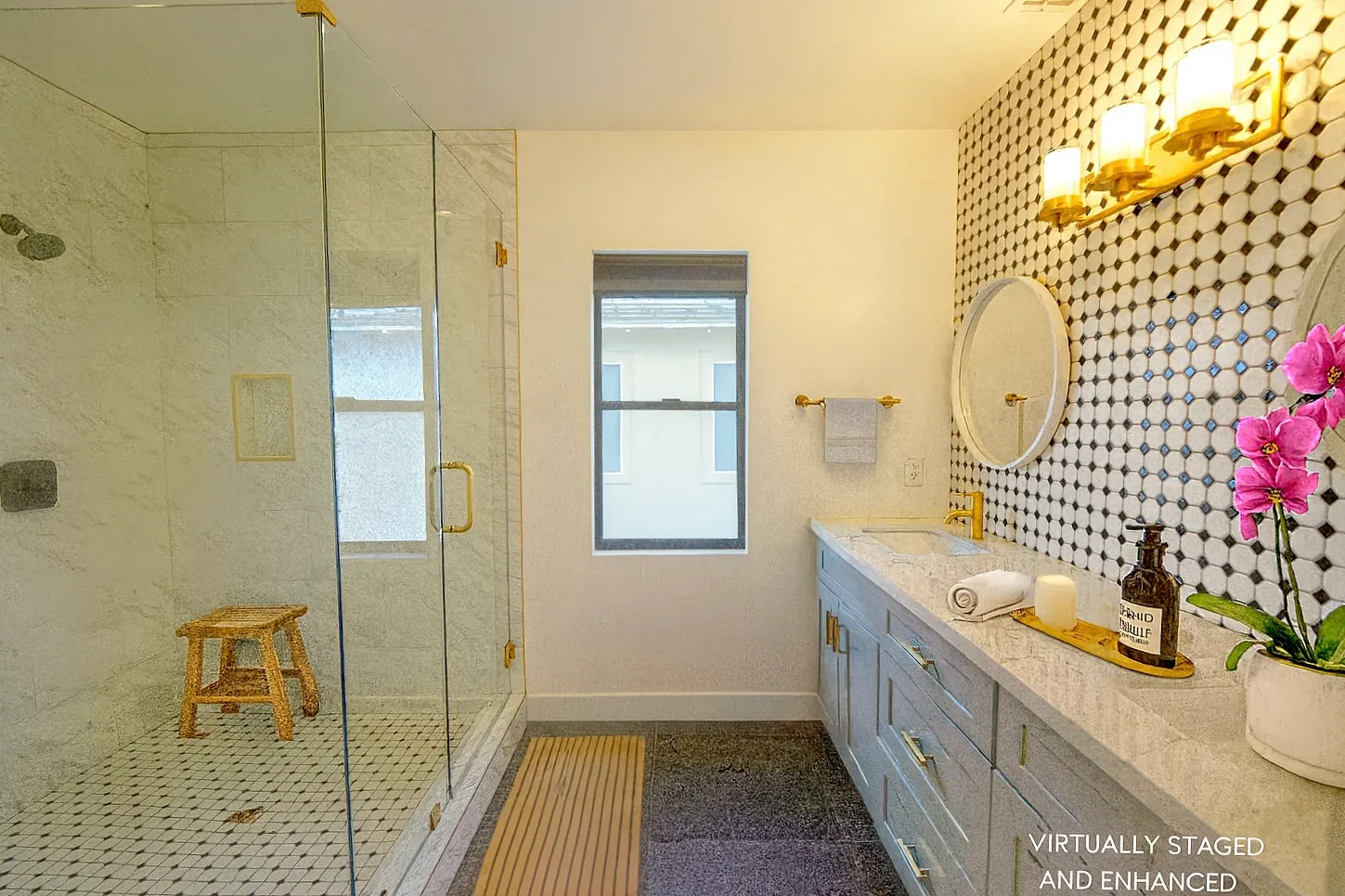 a bathroom with a sink a mirror and a shower