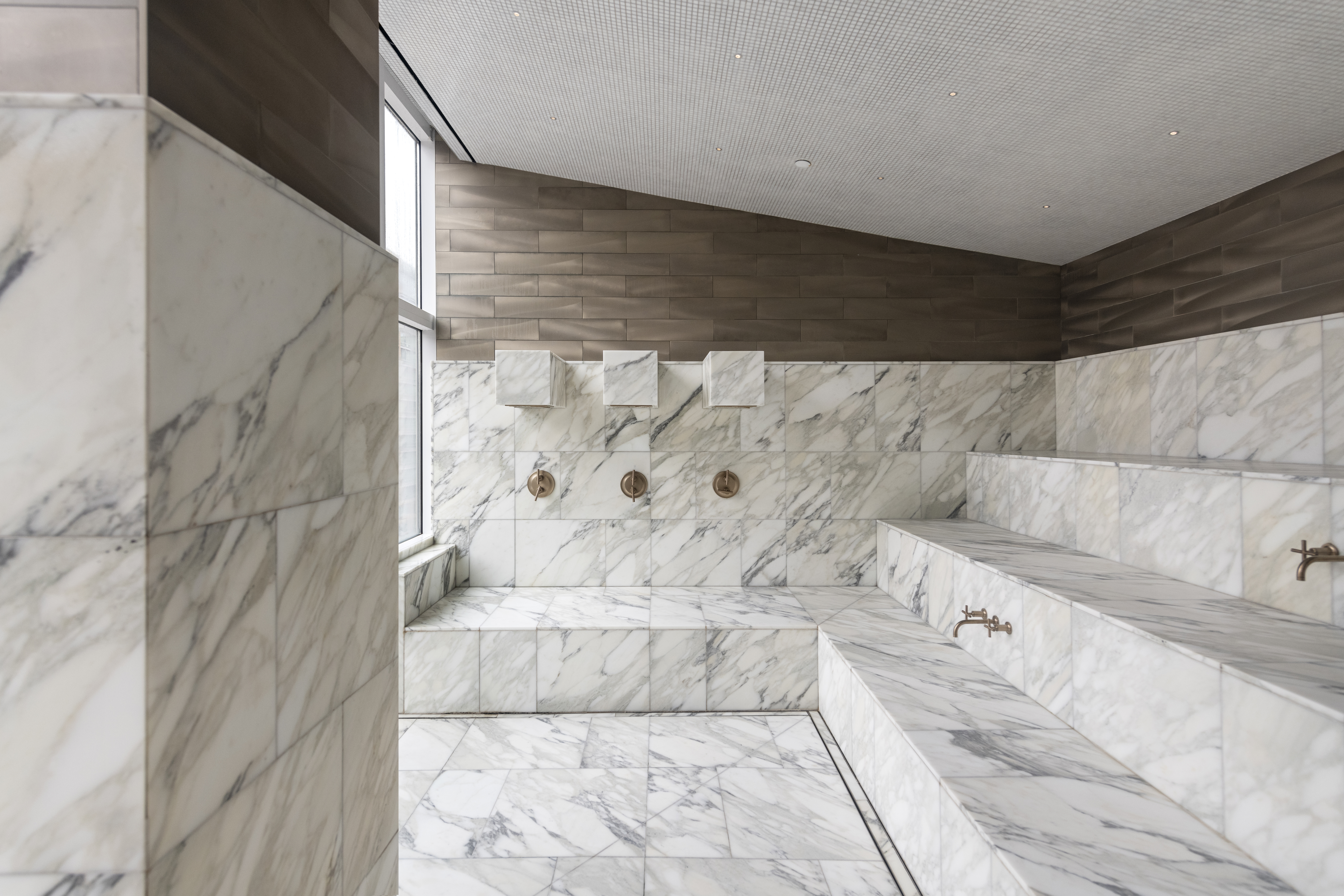 305 East 51st Street, Unit 11D Manhattan, NY 10022 - Photo 16 of 18 a bathroom with a bathtub and shower