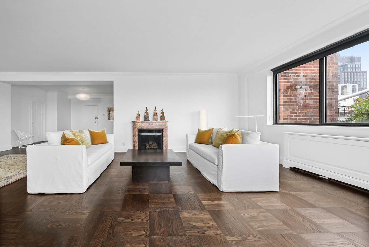 12 Beekman Place, Unit PHA Manhattan, NY 10022 - Photo 4 of 12 a living room with furniture and a fireplace